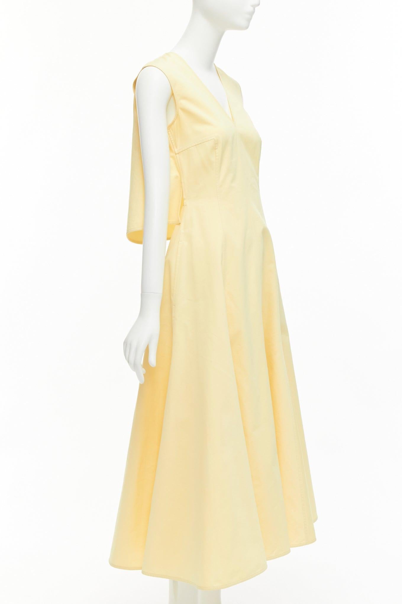 JIL SANDER cream cotton silk cape back cut out V-neck Aline midi dress FR32 XXS
Reference: LNKO/A02269
Brand: Jil Sander
Material: Cotton, Silk
Color: Cream
Pattern: Solid
Closure: Zip
Extra Details: Side zip.
Made in: Italy

CONDITION:
Condition: