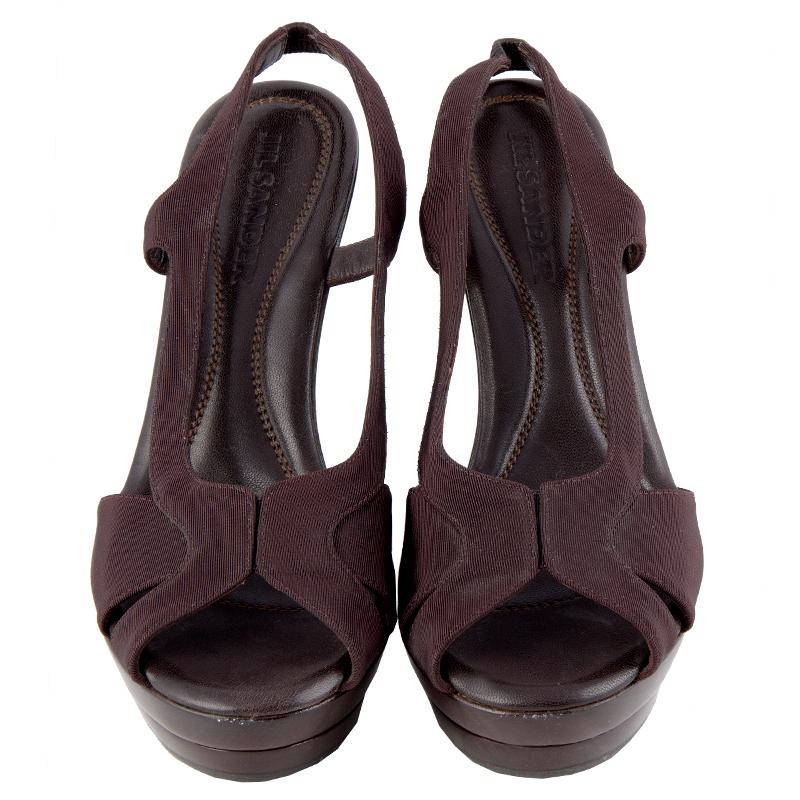 100% authentic Jil Sander platform peeptoe sandals in dark brown fabric and wooden platform. Brand new.

Measurements
Model	Platform
Imprinted Size	36
Shoe Size	36
Inside Sole	22.5cm (8.8in)
Width	7cm (2.7in)
Heel	11cm (4.3in)
Platform:	3cm