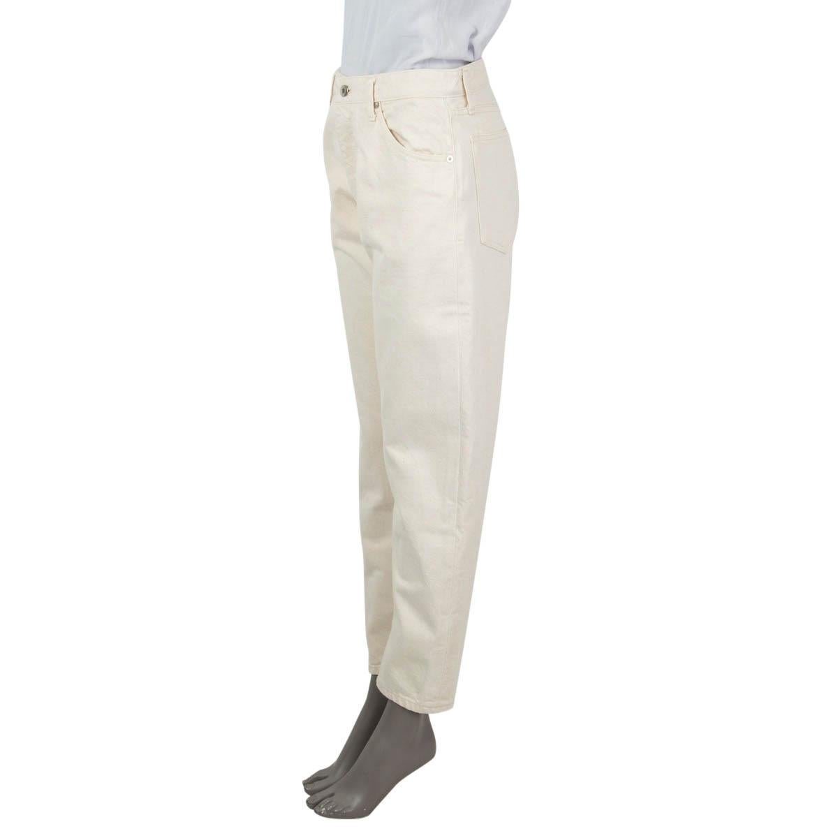 100% authentic Jil Sander + 90s cut high waisted jeans in creme white cotton (100%). Open with a zipper and one button in the front. Feature a high waist cut, belt loops, two rounded slit pockets on the front, two slit pockets on the back and a