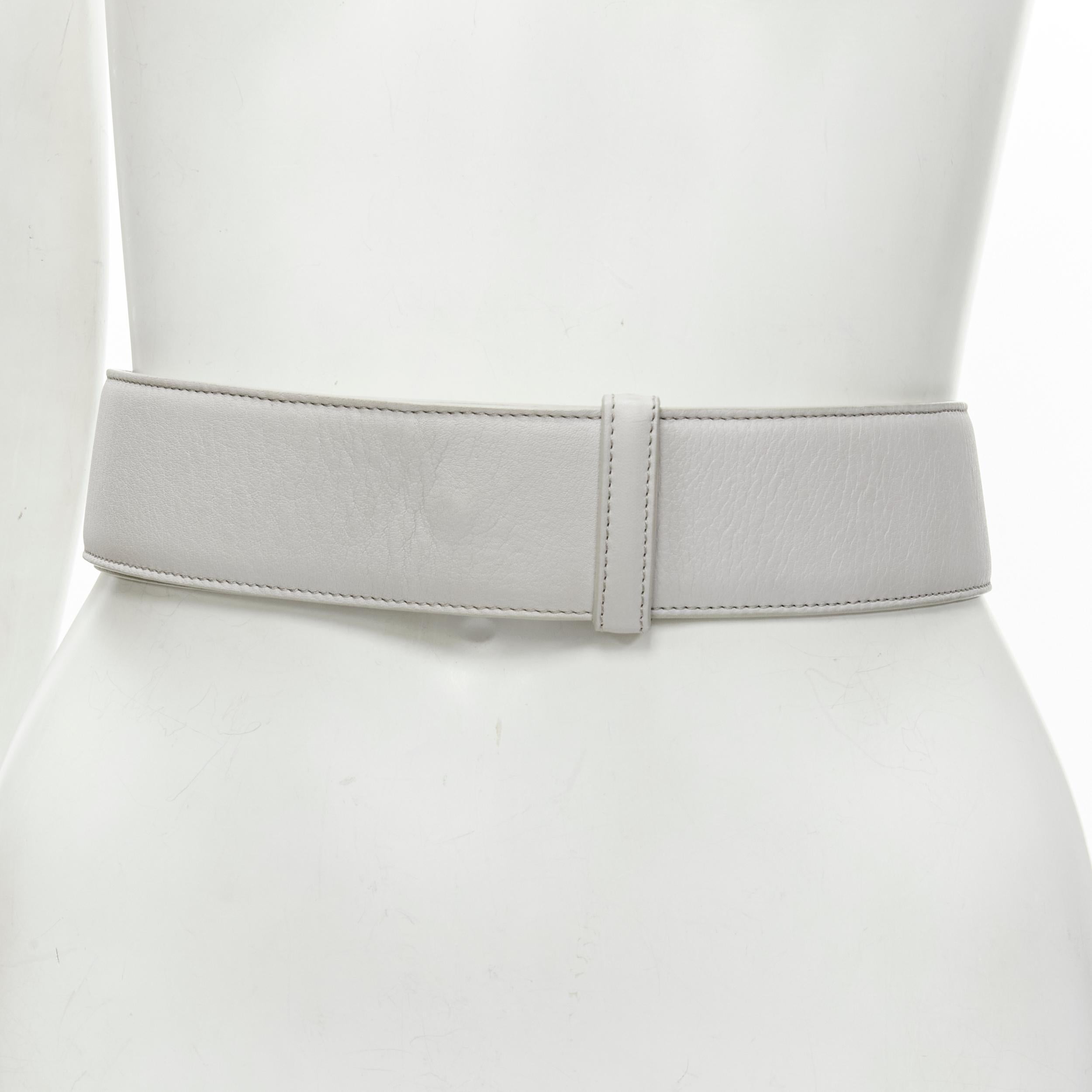 JIL SANDER light grey minimalist wide leather waist belt 75cm
Brand: Jil Sander
Material: Leather
Color: Grey
Pattern: Solid
Closure: Pin
Extra Detail: Minimalist closure. Concealed pin buckle.
Made in: Italy

CONDITION:
Condition: Very good, this