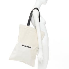 JIL SANDER Logo Print Canvas Long Tote beige canvas black leather trim bag