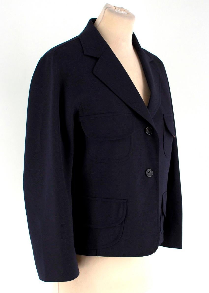 Jil Sander Navy Blazer

-Navy blazer with four front pockets
-Two-button closure
-Notched lapels
-Pink lining

Approx.

Length - 55cm
Shoulder width - 40cm
Sleeve length - 47cm