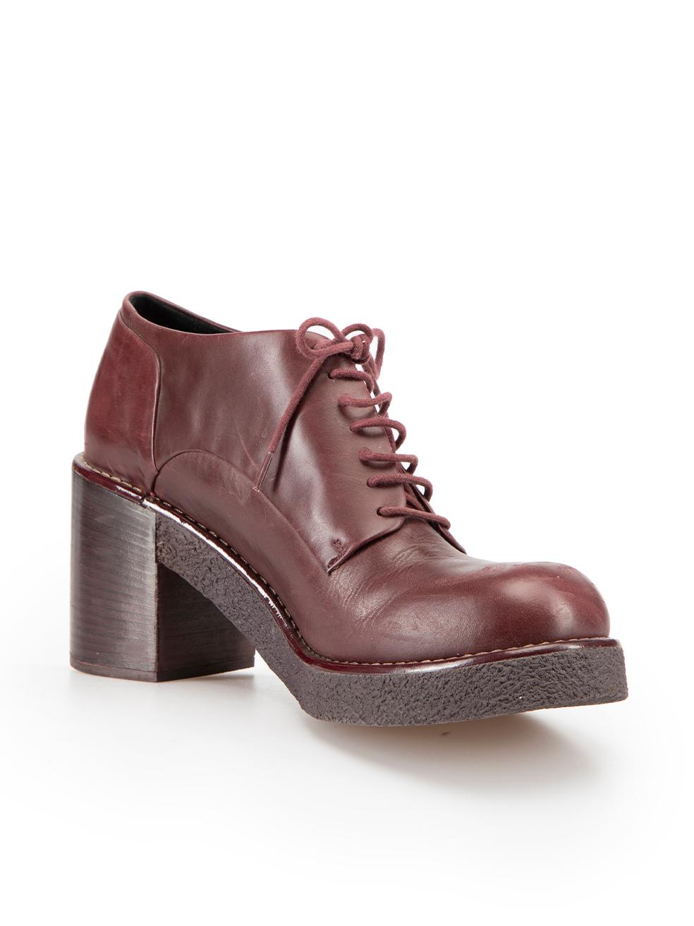 CONDITION is Good. Minor wear to shoes is evident. Light wear to both sides of both shoes and heels with scratches and scuffs on this used Jil Sander Navy designer resale item.



Details


Burgundy

Leather

Heeled oxfords

Mid block heel

Round