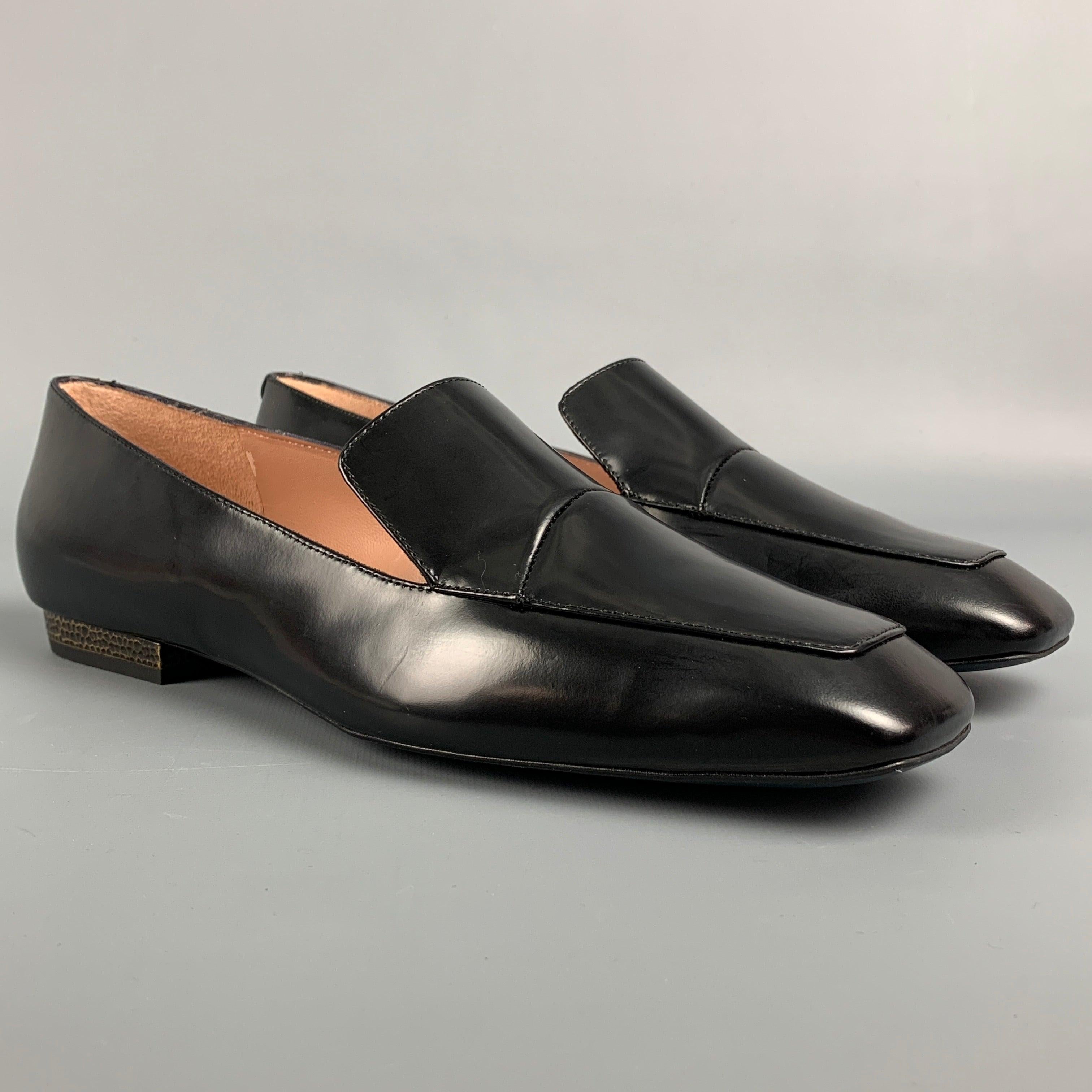 JIL SANDER Navy flats comes in a black leather featuring a slip on style and a square toe. Made in Italy.
 New With Box.
  
 

 Marked:  38.5Outsole: 10 inches x 3 inches 
  
  
  
 Sui Generis Reference: 111430
 Category: Flats
 More Details
  
