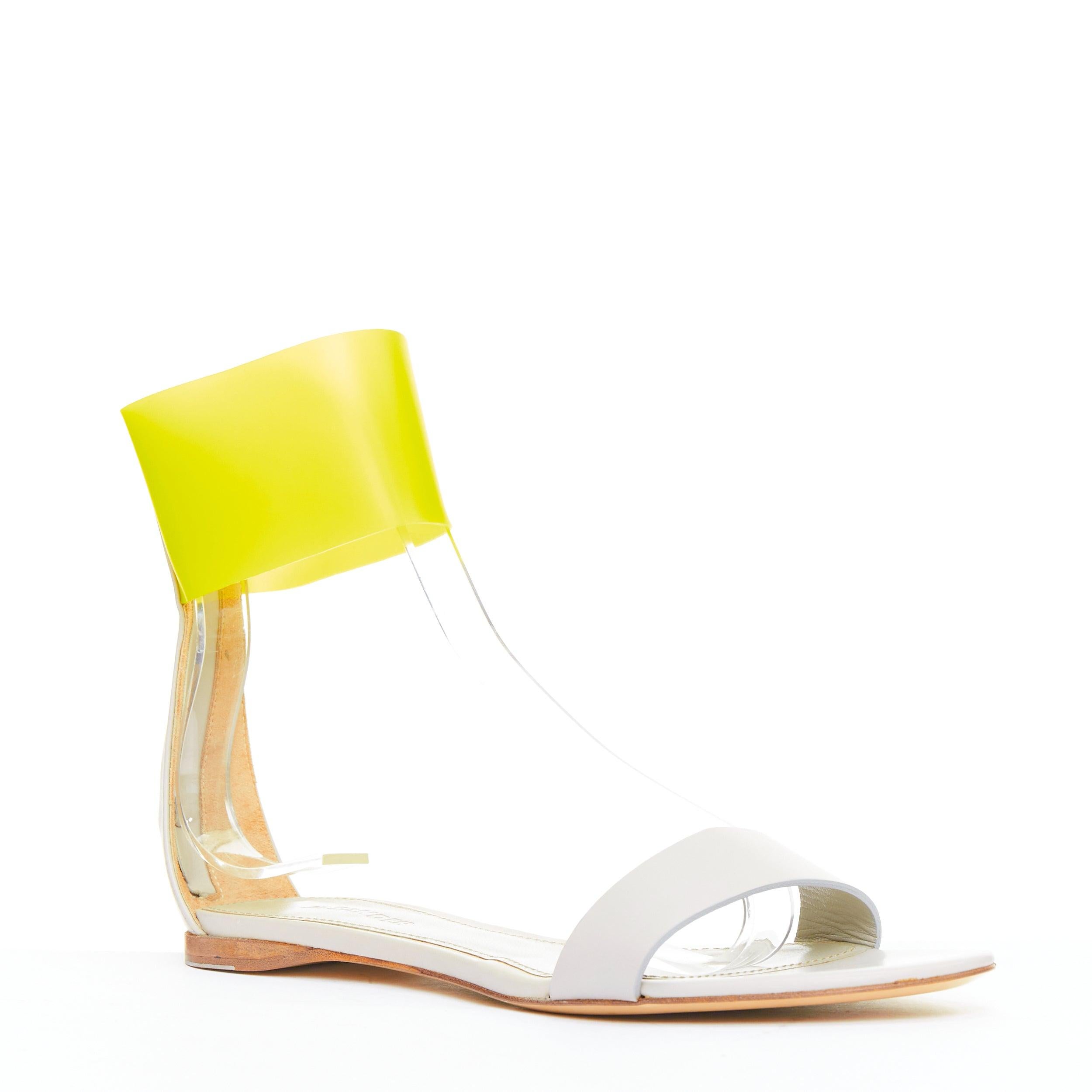 JIL SANDER sandali piatti in pelle grigia con cinturino alla caviglia giallo neon EU37
Riferimento: SNKO/A00427
Marchio: Jil Sander
Materiale: Gomma, Pelle
Colore: Grigio, Giallo neon
Modello: Tinta unita
Chiusura: zip
Fodera: Pelle grigia
Dettagli