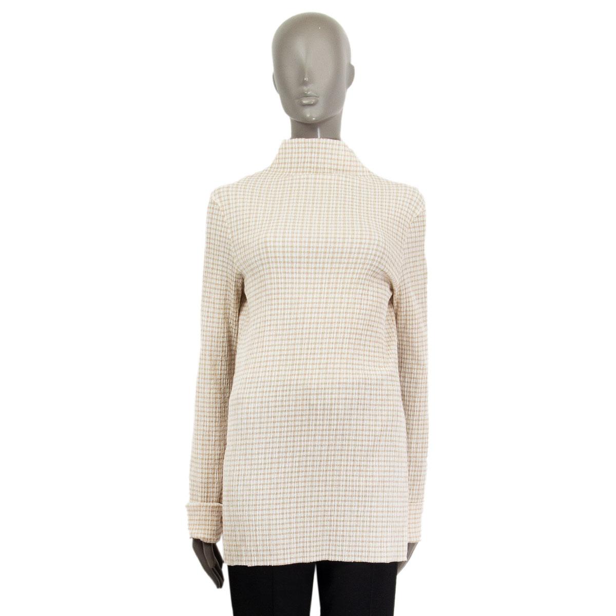 100% authentic Jil Sander long sleeve high collar blouse in off-white and beige stretchy cotton crepe and elastane (missing content tag). Unlined. Has been worn and is in excellent condition.

Measurements
Tag Size	Missing Tag (S/M) 
Shoulder