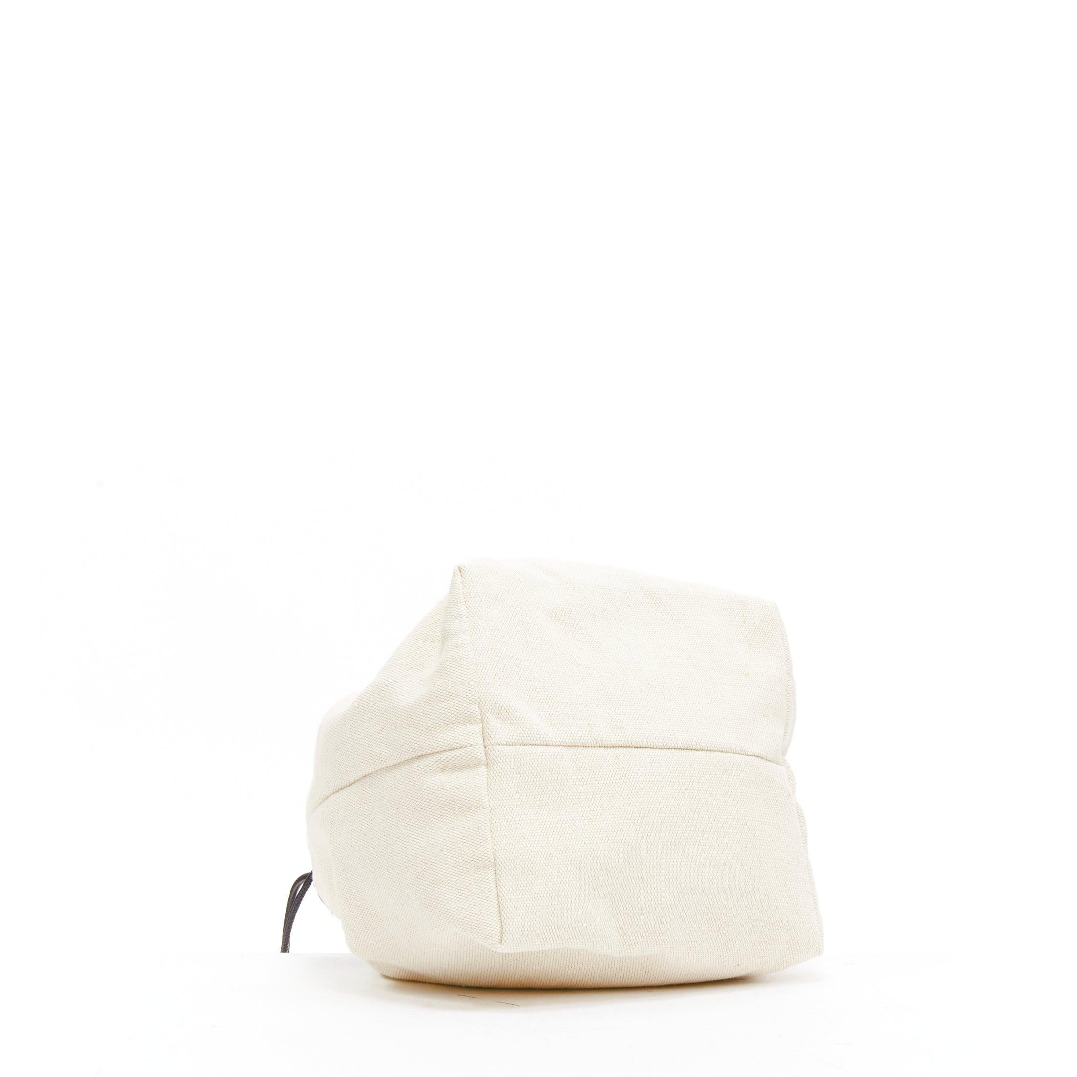 JIL SANDER off white canvas black leather logo drawstring pouch bucket bag 1