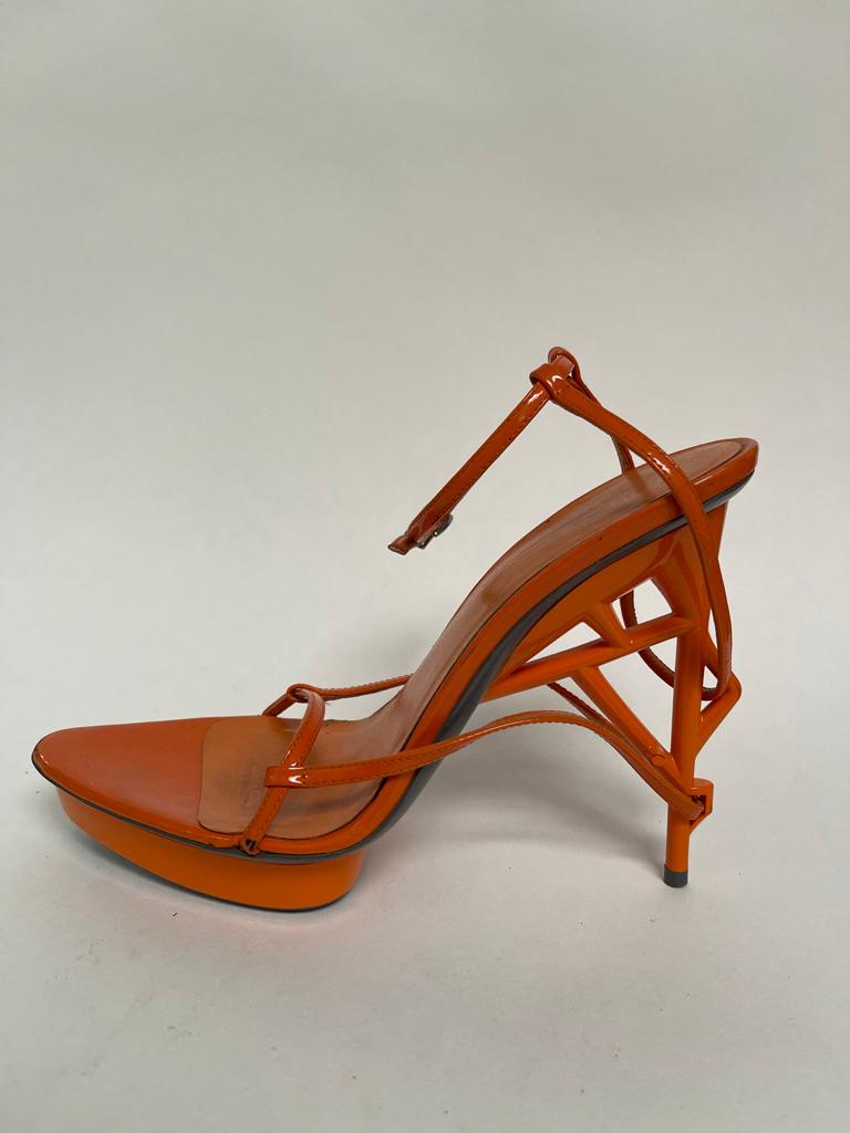 A fun architectural shoe, bright orange and fun. 