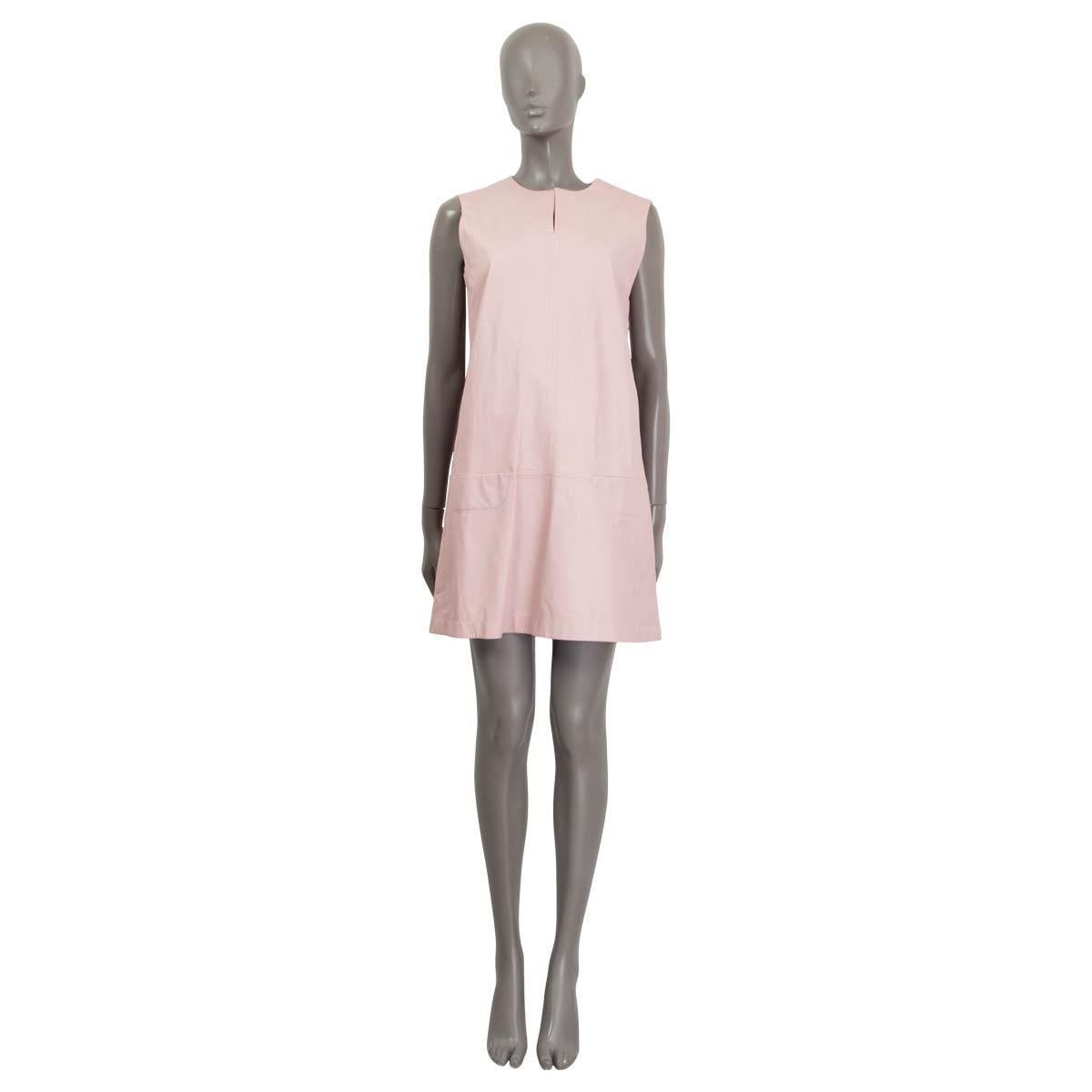 100% authentic Jil Sander shift dress in rose sheep leather (100%). Comes with a slit neck and two patch pockets on the front. Opens with a concealed zipper on the side. Lined in off-white cotton (100%). Has been worn and is in excellent