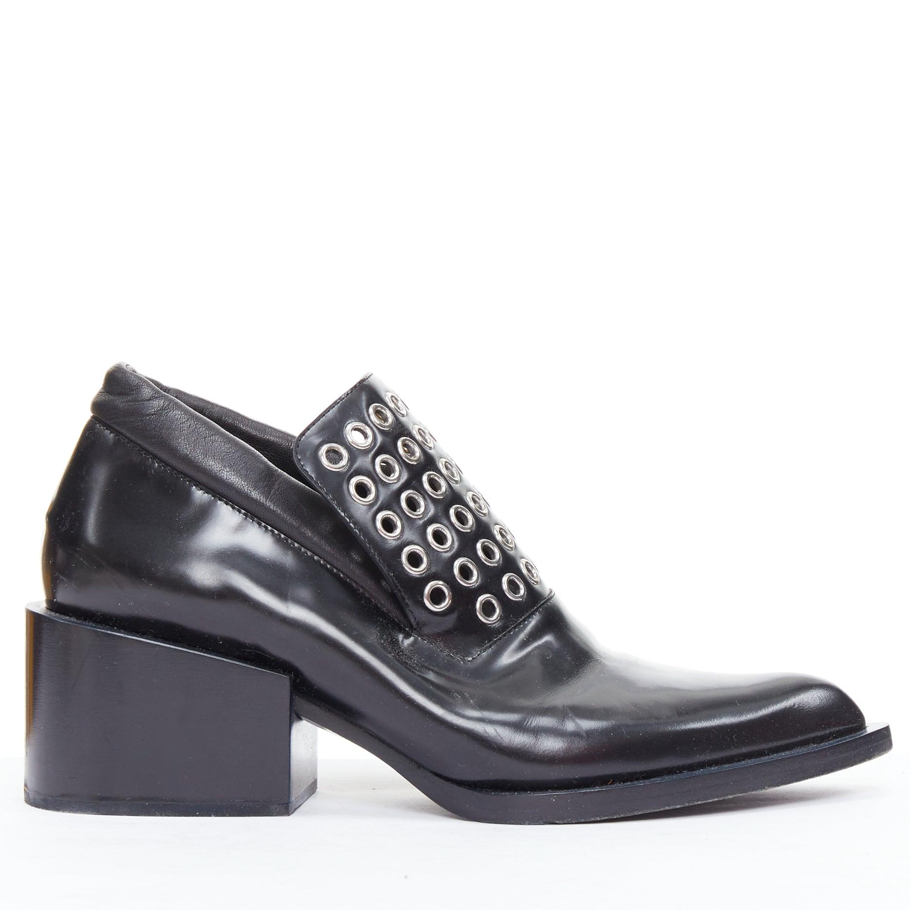 JIL SANDER silver grommet black leather block heel loafer EU38
Reference: ECLO/A00133
Brand: Jil Sander
Material: Leather
Color: Black, Silver
Pattern: Solid
Closure: Slip On
Lining: White Leather
Extra Details: The loafer style of Jil Sander's