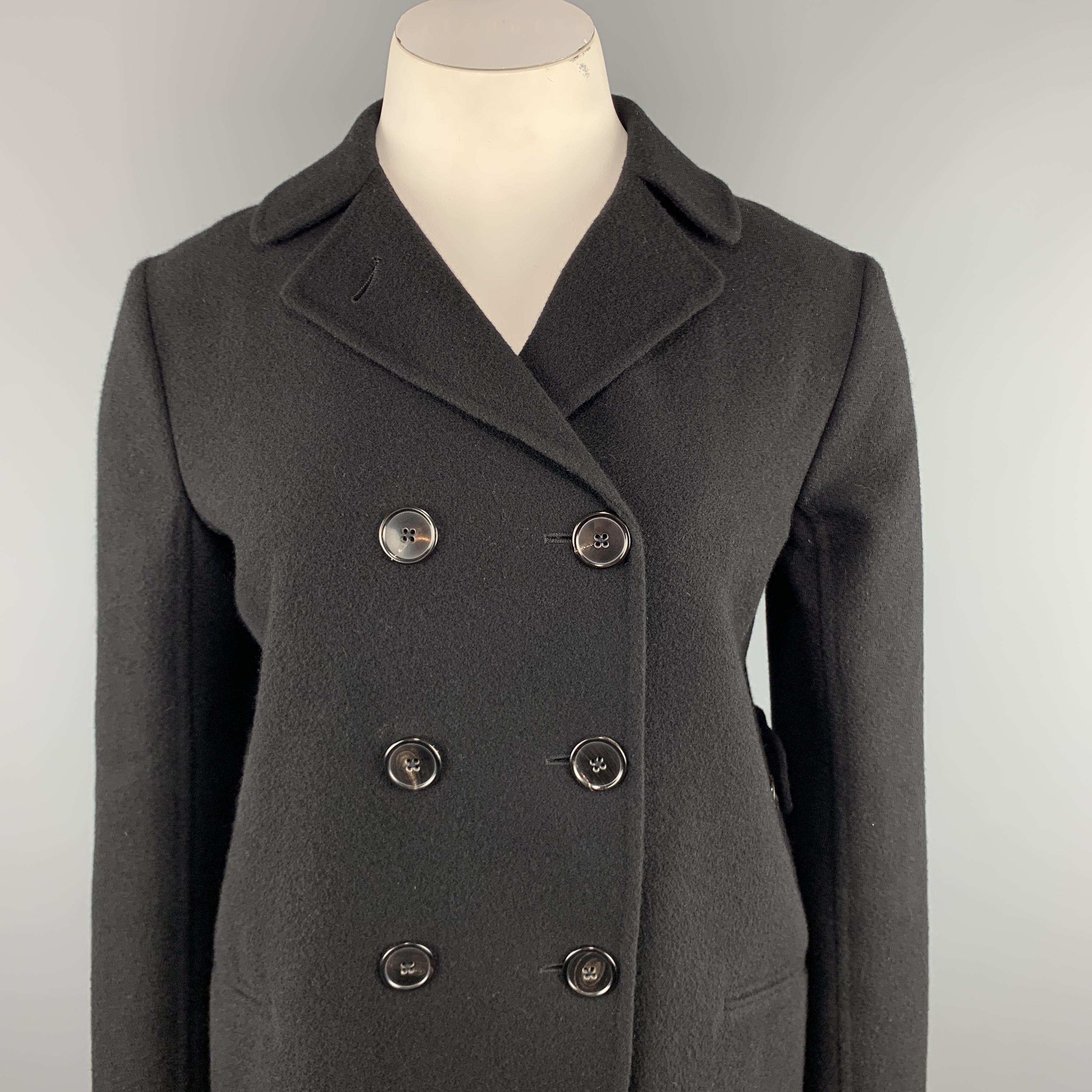 JIL SANDER coat comes in cashmere knit flannel with a pointed lapel, double breasted button up front, button tabs, and slanted slit pockets. Made In Italy.

Excellent Pre-Owned Condition. Retails: $2,500.00.
Marked: DE 40

Measurements:

Shoulder: