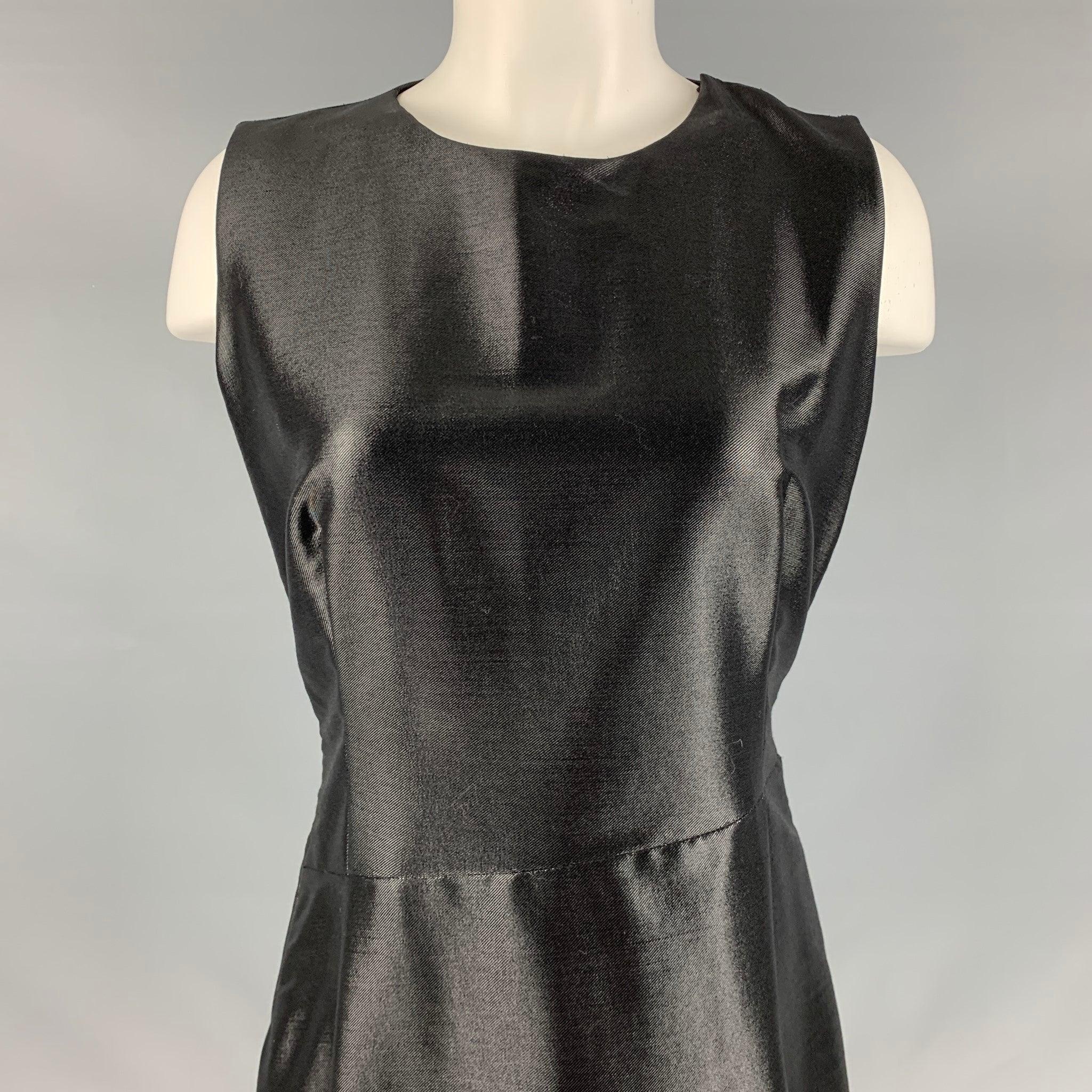 JIL SANDER dress
in a black wool and nylon blend fabric featuring a shiny style, asymmetrical drop waist, and side zipper. Made in Italy.Very Good Pre-Owned Condition. Minor signs of wear. 

Marked:  size not marked. 

Measurements: 
 
Shoulder: 14