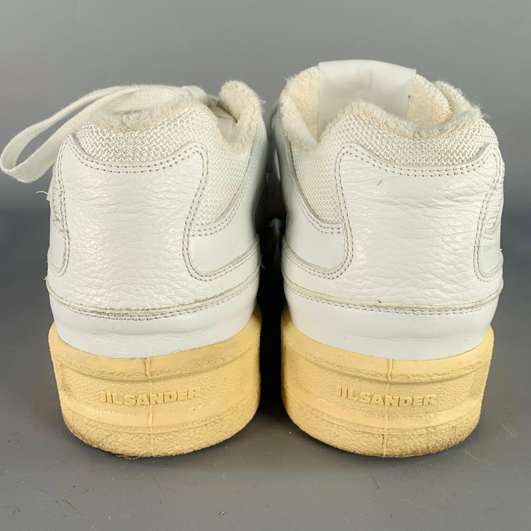 JIL SANDER Size 10 White Leather Rubber Sole Lace-Up Low Top Sneakers In Good Condition For Sale In San Francisco, CA