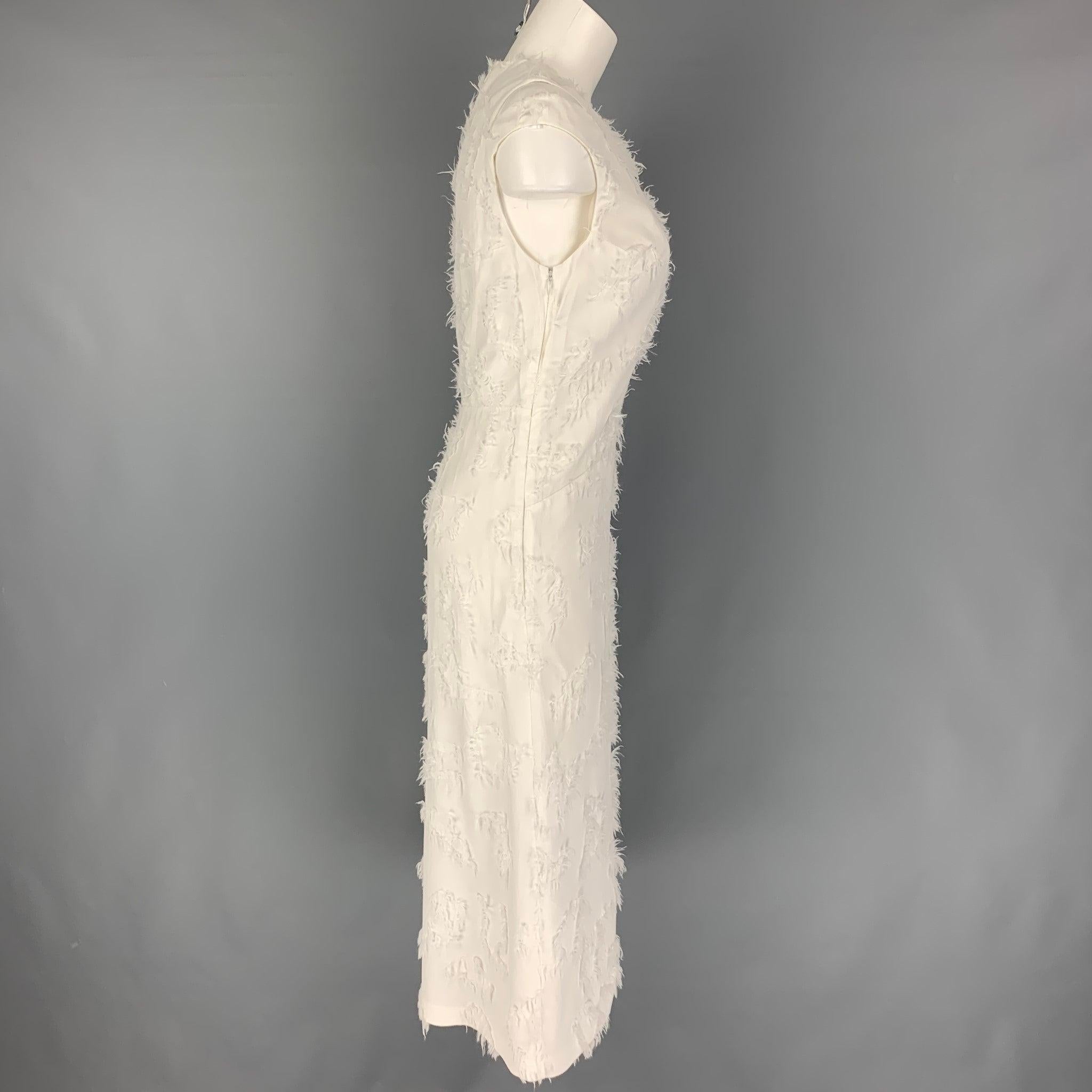 JIL SANDER dress comes in a white textured viscose featuring cut-out details, sleeveless, and a zip up closure. Made in Italy.
Very Good
Pre-Owned Condition. 

Marked:   34 

Measurements: 
 
Shoulder: 13 inches  Bust:
30 inches  Waist: 28 inches 