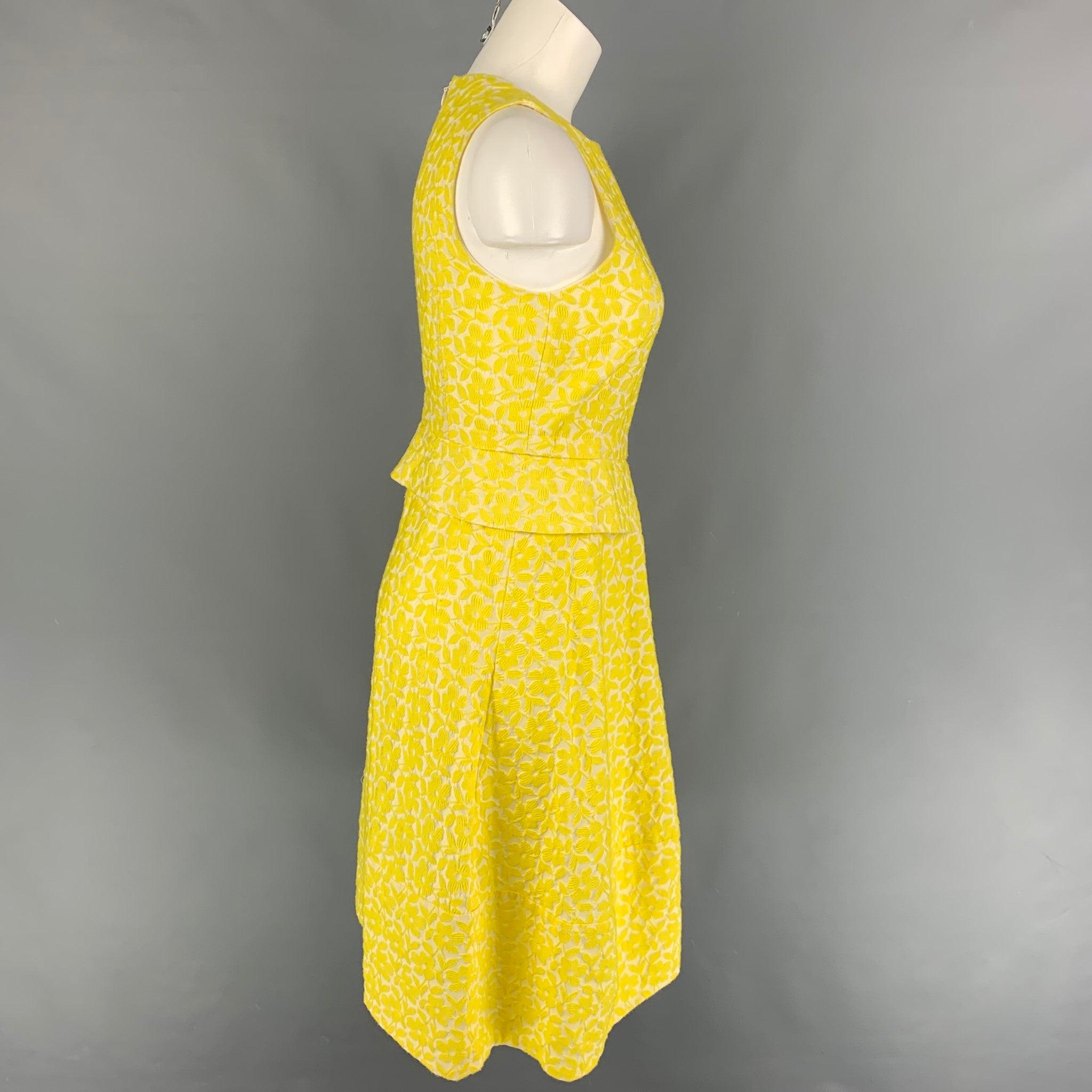 JIL SANDER dress comes in a yellow & white jacquard cotton blend featuring a a-line style, sleeveless, front panel detail, and a back zip up closure. Made in Italy.
Very Good
Pre-Owned Condition. 

Marked:   34 

Measurements: 
 
Shoulder: 11.5