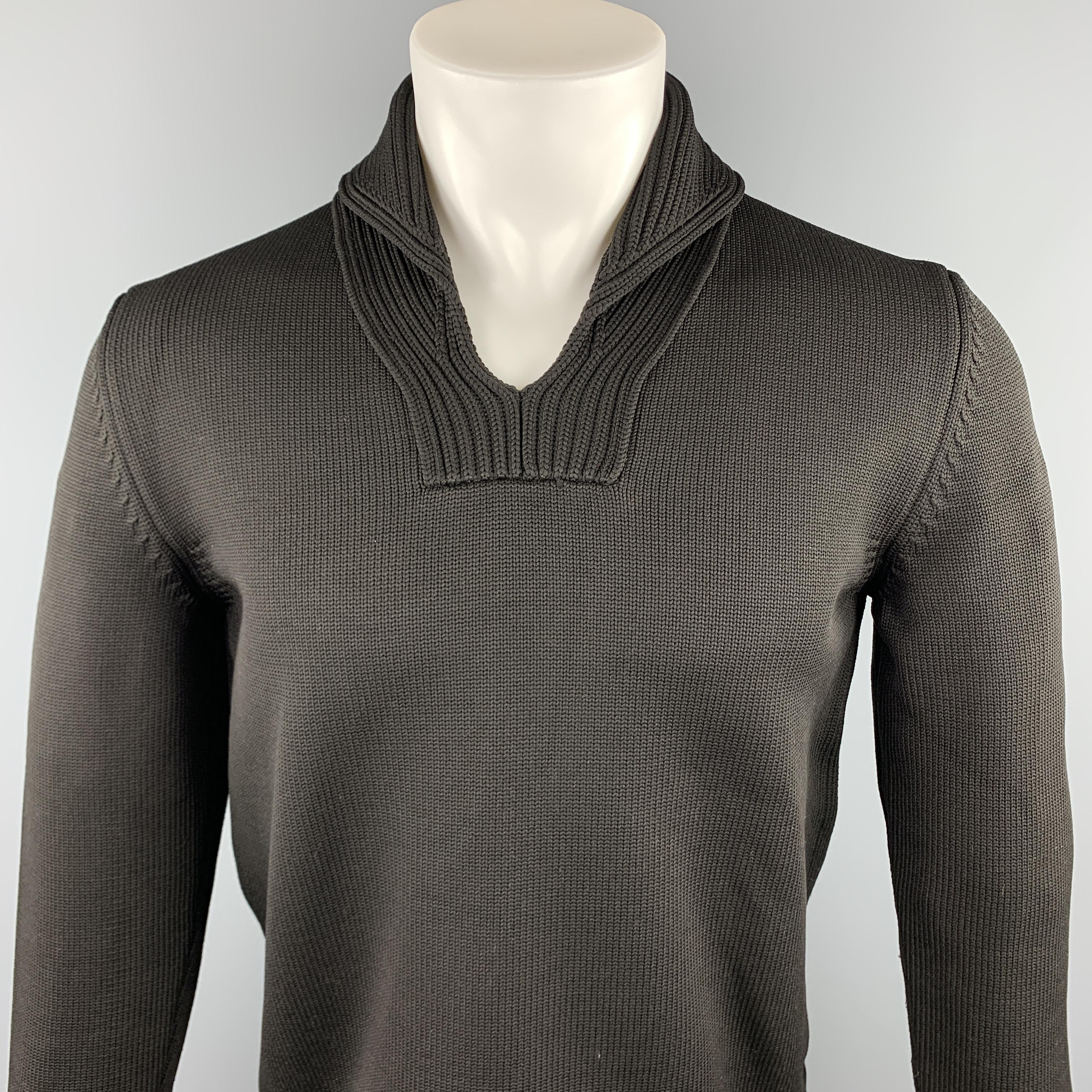 JIL SANDER sweater comes in a black knitted polypropylene featuring a shawl collar. Made in Italy.

Excellent Pre-Owned Condition.
Marked: IT 48

Measurements:

Shoulder: 17 in. 
Chest: 38 in. 
Sleeve: 24.5 in. 
Length: 24.5 in. 