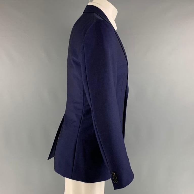 JIL SANDER Tailor Made sport coat comes in royal blue woven material featuring a notch lapel, single breasted, flap pockets, and Single vented back. Made in Italy.Excellent Pre-Owned Condition.  

Marked:   48 

Measurements: 
 
Shoulder: 17 inches