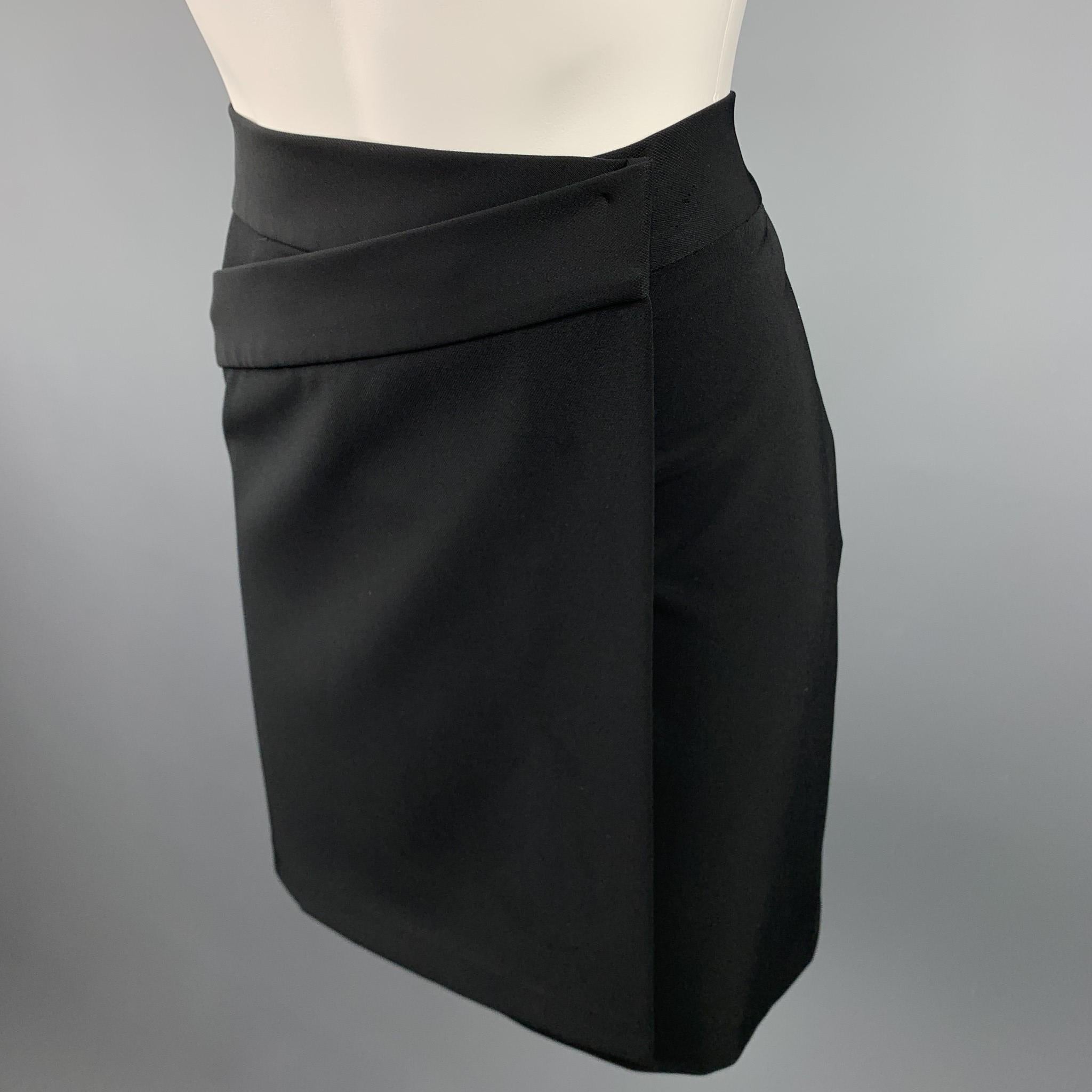 JIL SANDER skirt comes in a black twill polyester featuring a wrap style with a button & front tab closure. made in Italy.

Excellent Pre-Owned Condition.
Marked: IT 36

Measurements:

Waist: 32 in. 
Hip: 36 in. 
Length:  19 in. 