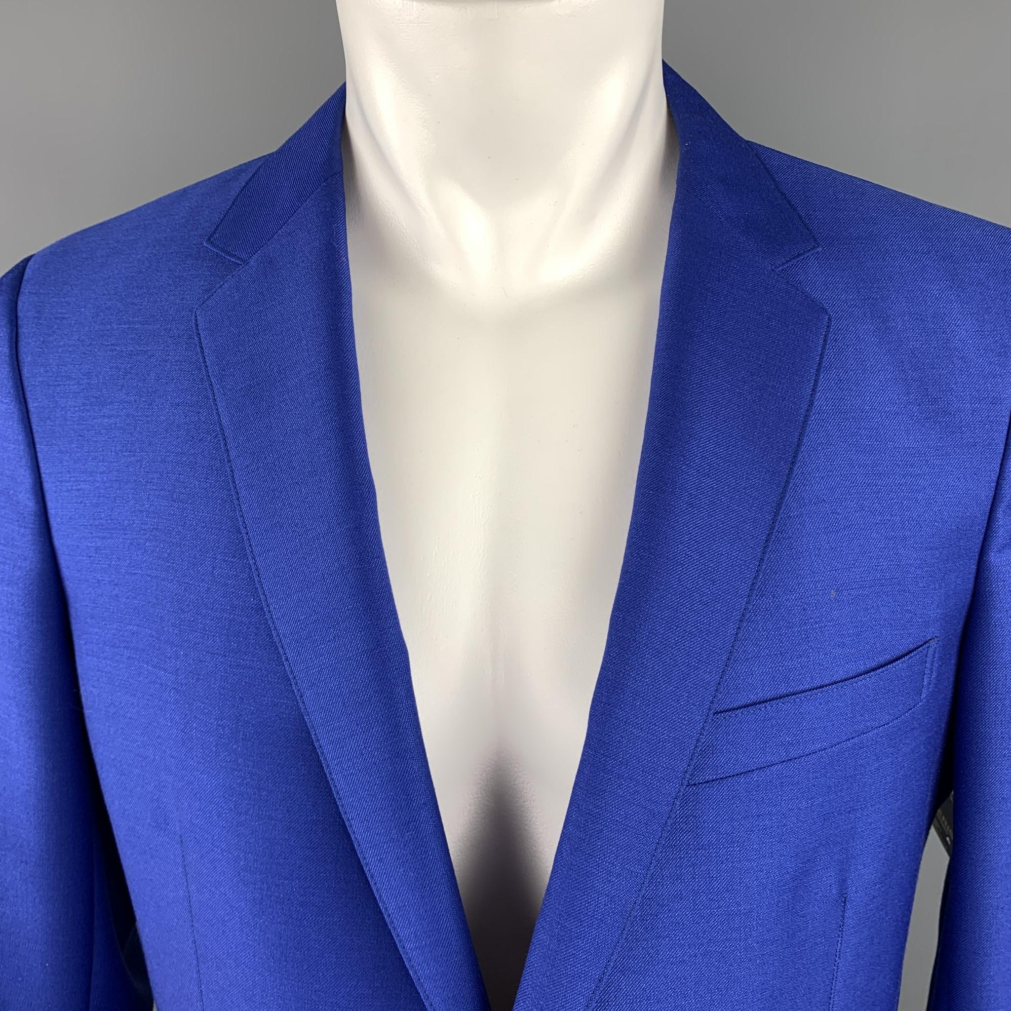 JIL SANDER by RAF SIMONS sport coat comes in vibrant royal blue wool mohair blend with a notch lapel, single breasted, two button front, and cropped effect sleeves. Made in Italy.

Excellent Pre-Owned Condition.
Marked: IT
