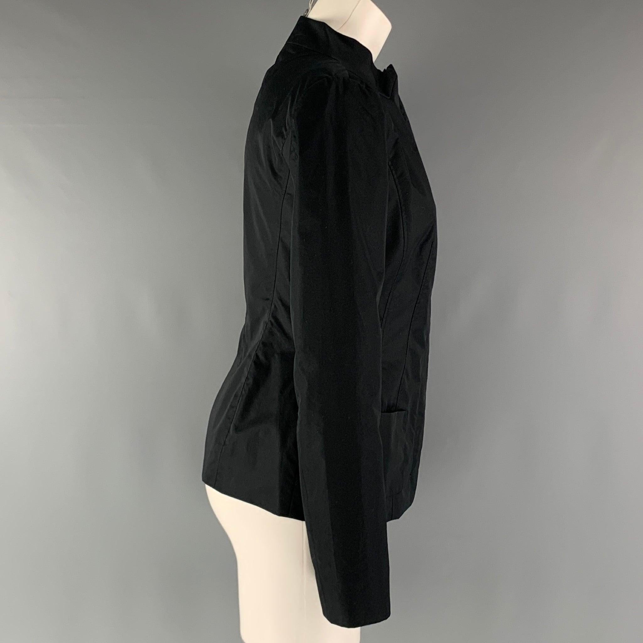 JIL SANDER jacket comes in a black cotton and polyester woven material featuring a front pockets, and a zip up button closure. Made in Italy.New with Tags. 

Marked:   36 

Measurements: 
 
Shoulder: 15.5 inches 
 
 Bust: 40 inches Sleeve: 24.5