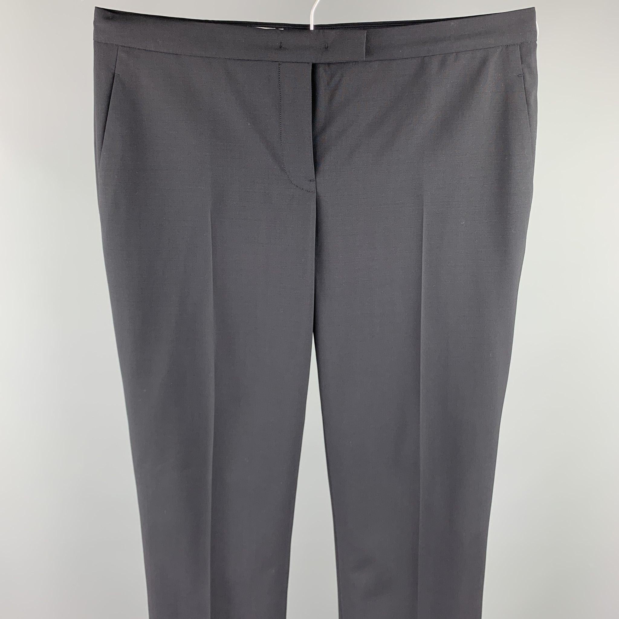 JIL SANDER dress pants comes in a black fabric featuring a straight leg and a zip fly closure. Made in Italy.Excellent
Pre-Owned Condition. 

Marked:   38 

Measurements: 
  Waist: 32 inches 
Rise: 7.5 inches 
Inseam: 31 inches 
  
  
 
Reference: