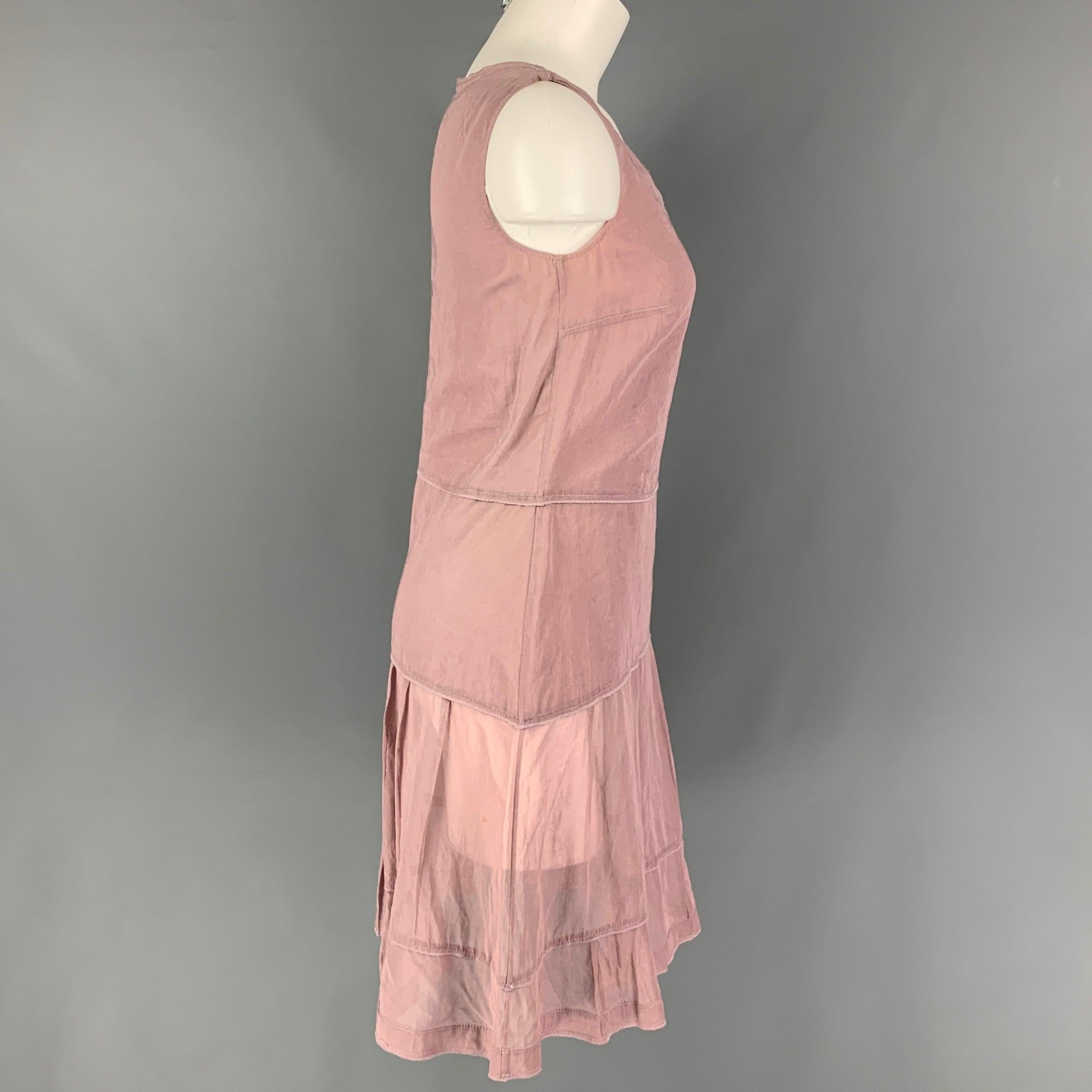 JIL SANDER dress comes in a dust pink cotton featuring a pleated style, double layered, sleeveless, and a side zipper closure. Made in Italy.
Good
Pre-Owned Condition. Small mark at front. As-Is.  

Marked:   36 

Measurements: 
 
Shoulder: 13