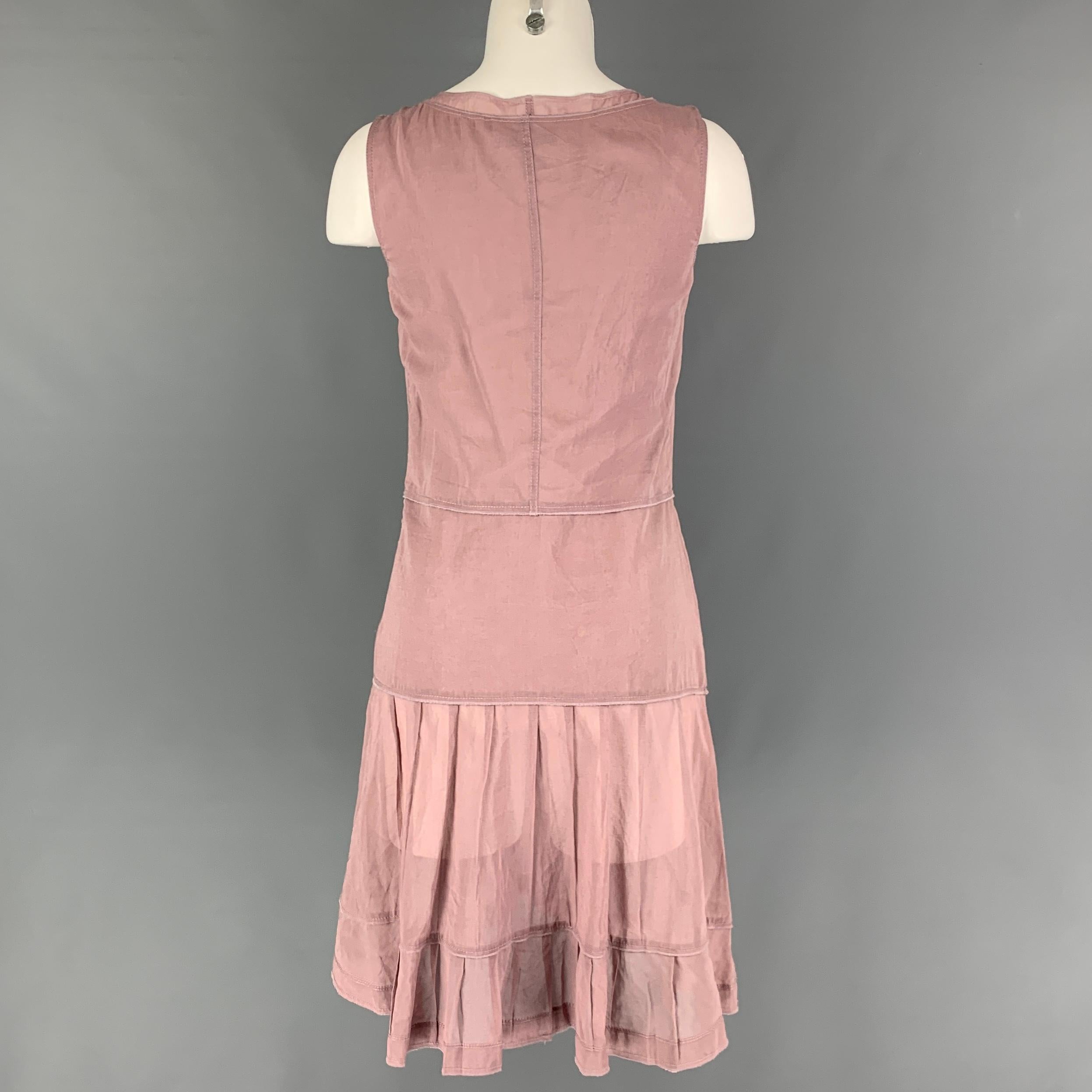 JIL SANDER dress comes in a dust pink cotton featuring a pleated style, double layered, sleeveless, and a side zipper closure. Made in Italy. 

Good Pre-Owned Condition. Small mark at front. As-Is.
Marked: 36

Measurements:

Shoulder: 13 in.
Bust: