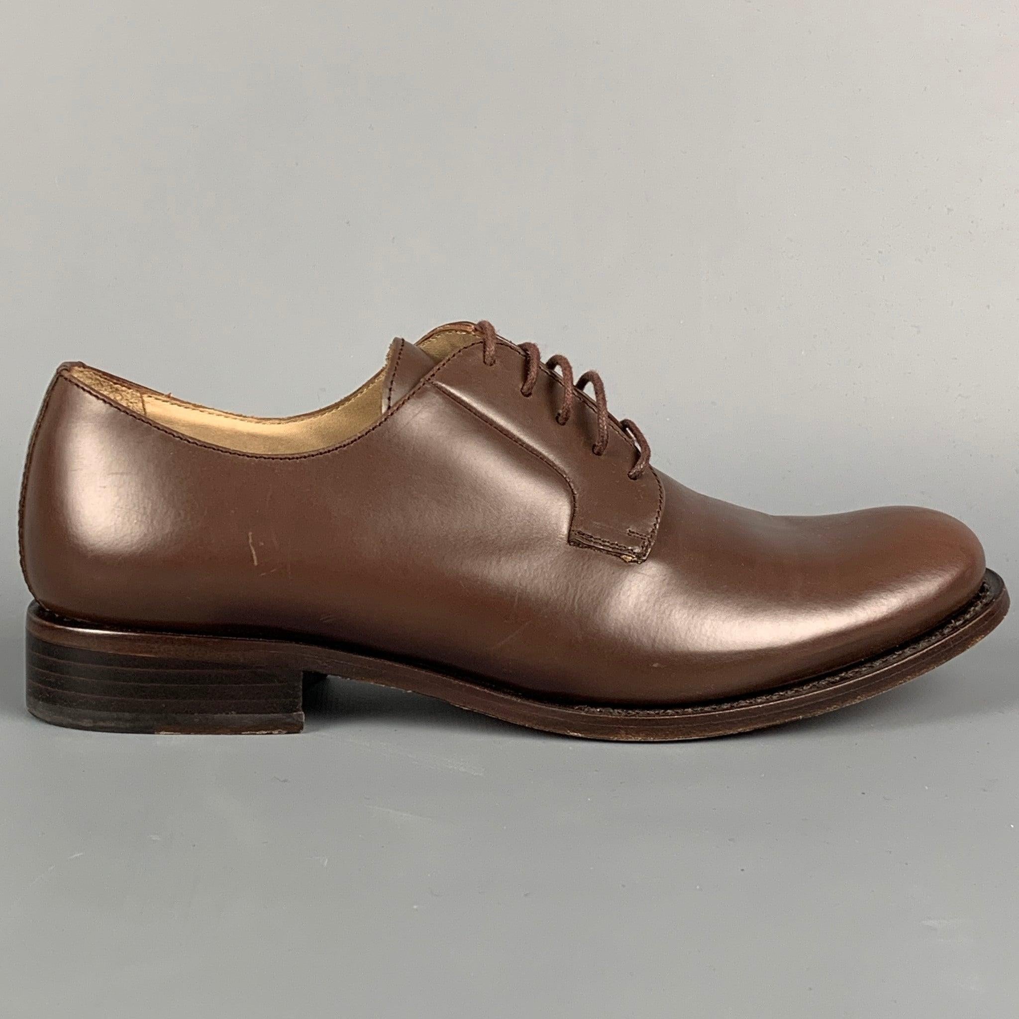 JIL SANDER shoes in a brown leather featuring a derby style and a lace-up closure. Made in Italy.
Very Good
Pre-Owned Condition. 

Marked:   36.5Outsole: 10 inches  x 3.5 inches 

  
  
 
Sui Generis Reference: 135573
Category: Laces
More Details
  