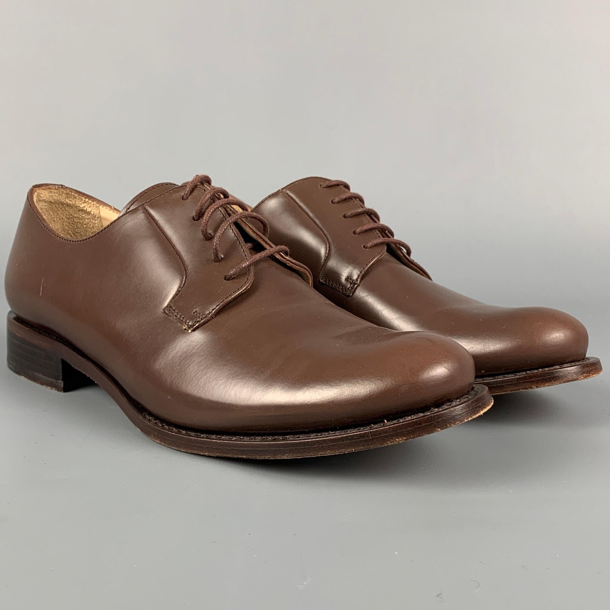 JIL SANDER shoes comes in a brown leather featuring a chunky heel and a lace up closure. Made in Italy. 

Very Good Pre-Owned Condition.
Marked: 36.5

Outsole: 10 in. x 3.5 in. 