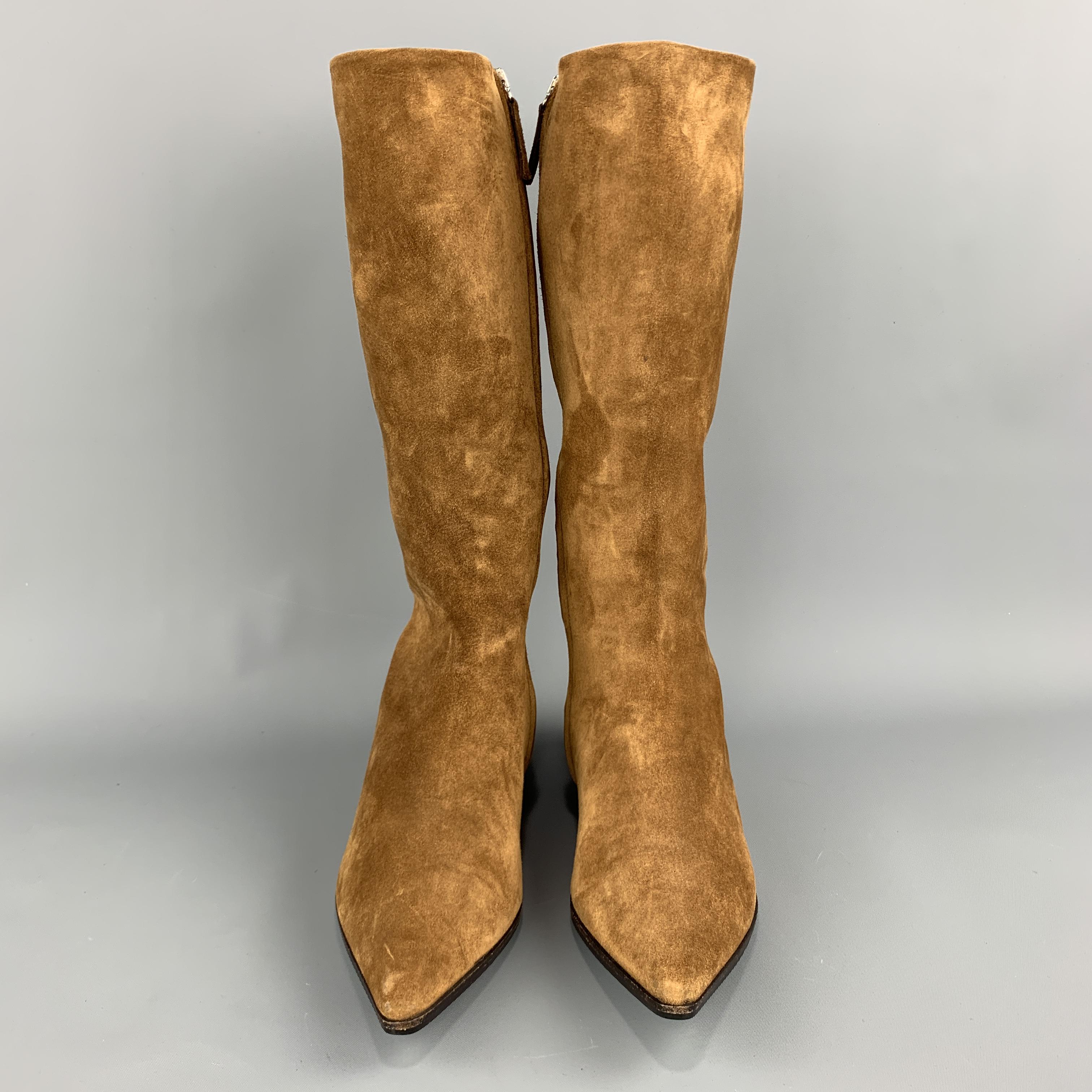 JIL SANDER boots come in caramel tan suede with a pointed toe and calf high shaft. Made in Italy.

Very Good Pre-Owned Condition.
Marked: IT 37.5

Outsole: 10.75 x 3 in.
Length: 14 in.