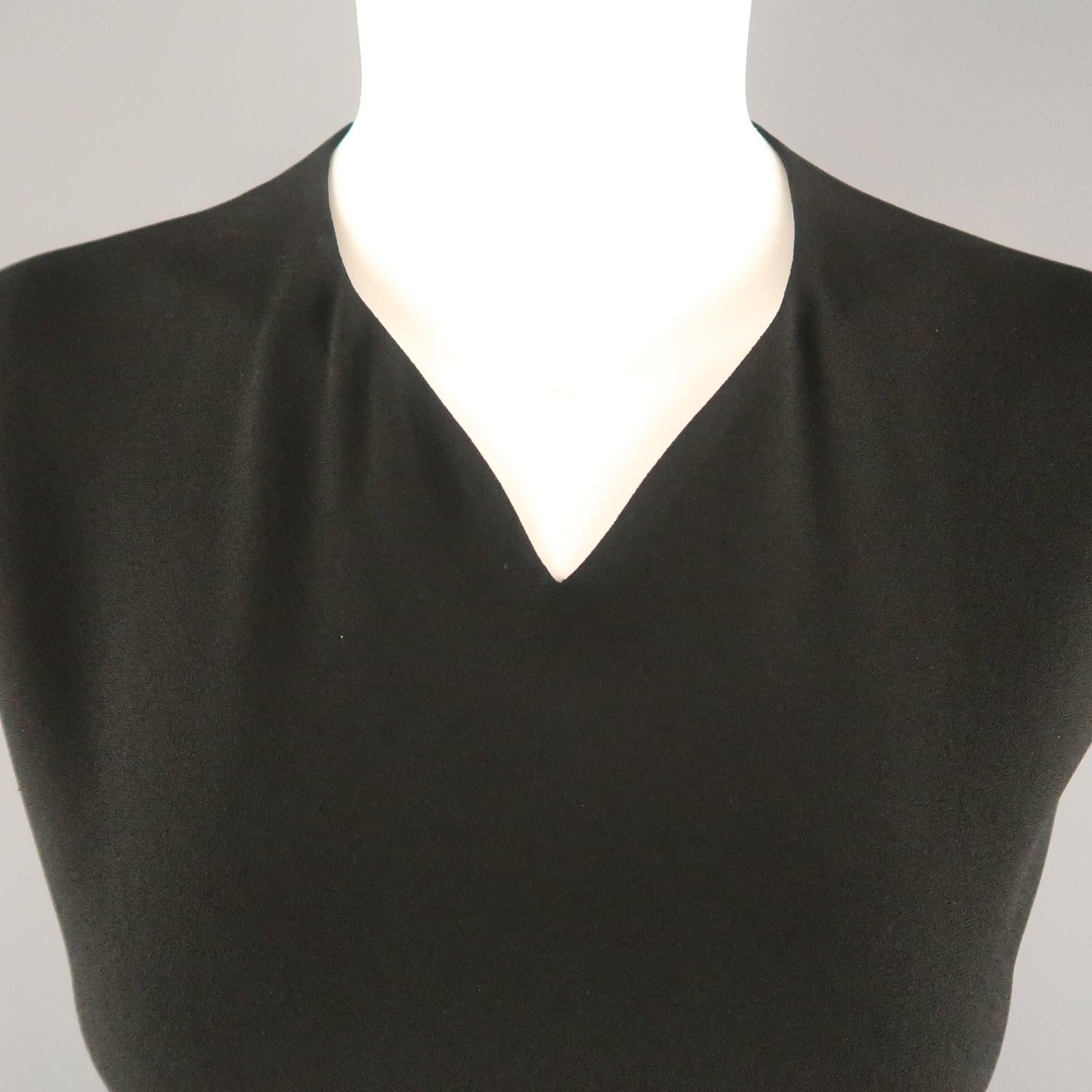 JIL SANDER shift dress comes in black crepe with a V neck, 
and back slit cutouts. Made in Italy.
Excellent Pre-Owned Condition.
 

Marked:  IT 40
 

Measurements: 
 
l	Shoulder: 15.5 inches 
l	Bust: 38 inches 
l	Waist: 34 inches 
l	Hip: 40 inches