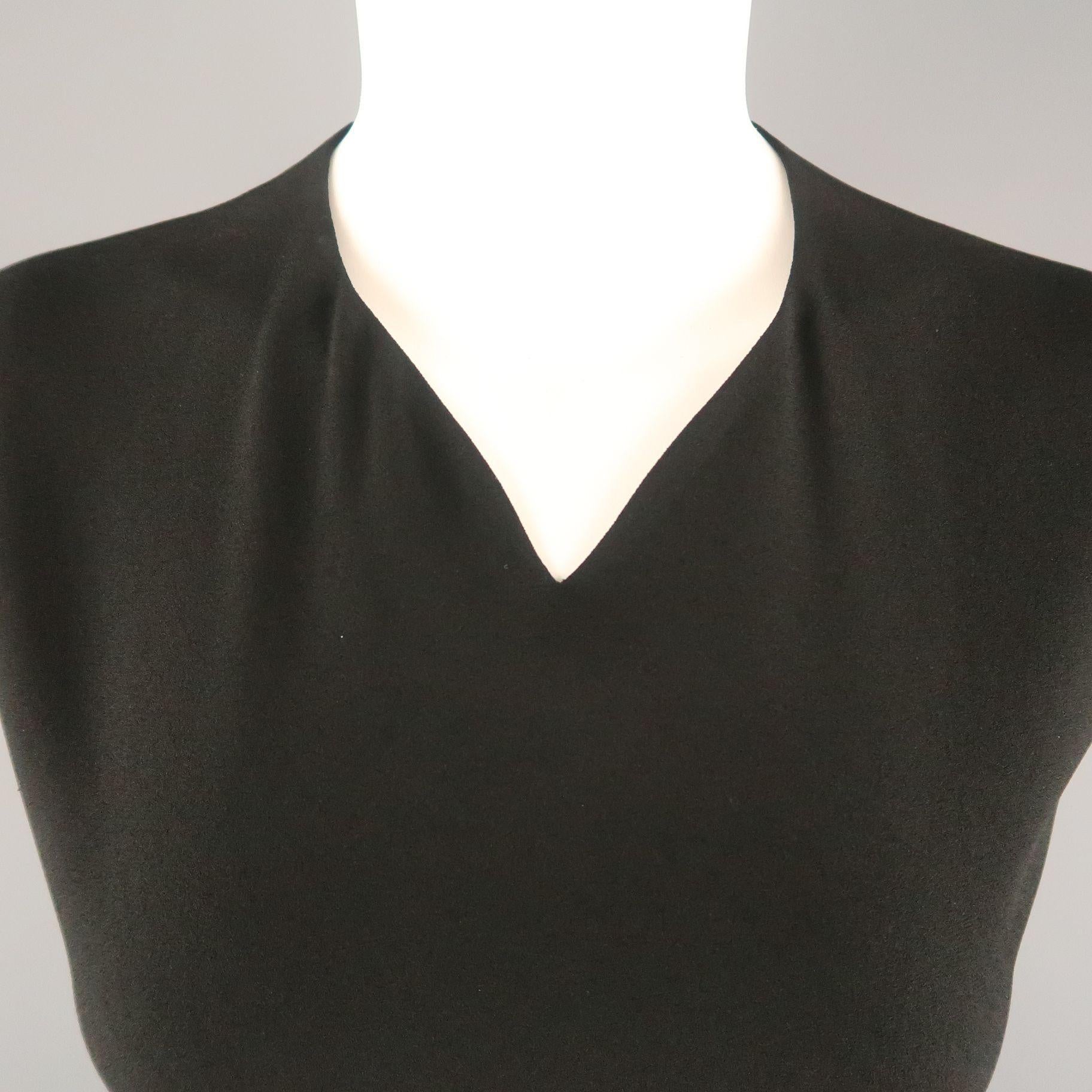 JIL SANDER shift dress comes in black crepe with a V neck,  and back slit cutouts. Made in Italy.

Excellent Pre-Owned Condition.
Marked: IT 40

Measurements:

Shoulder: 15.5 in.
Bust: 38 in.
Waist: 34 in.
Hip: 40 in.
Length: 41 in.