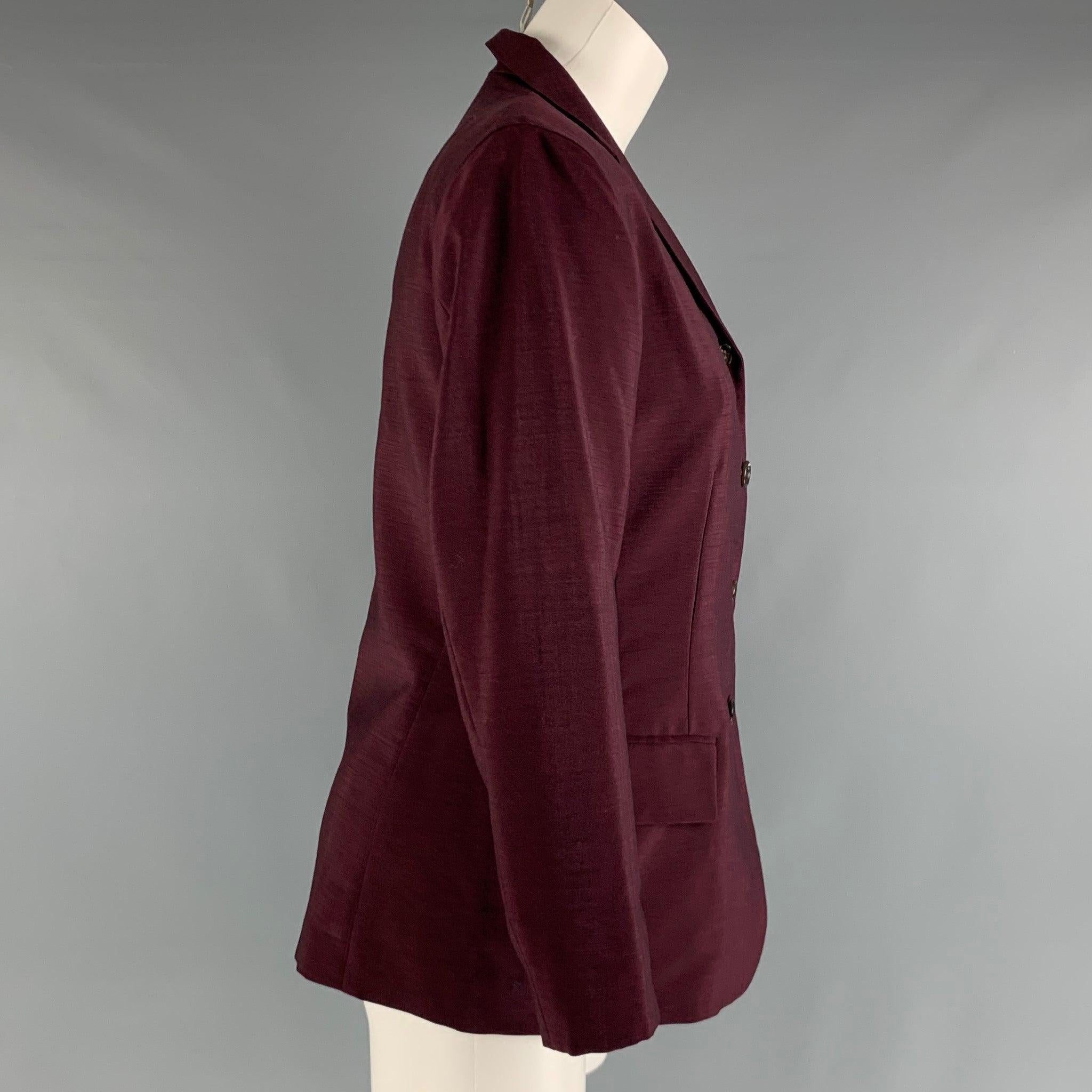 JIL SANDER jacket comes in a burgundy wool and mohair woven material featuring a front pockets, and a four button closure. Made in Germany.Excellent Pre- Owned Conditions. 

Marked:   38 

Measurements: 
 
Shoulder: 16 inches  
 Bust: 36 inches