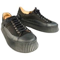 Jil Sander taglia 9 Scarpe da ginnastica in tela nera con suola in crêpe