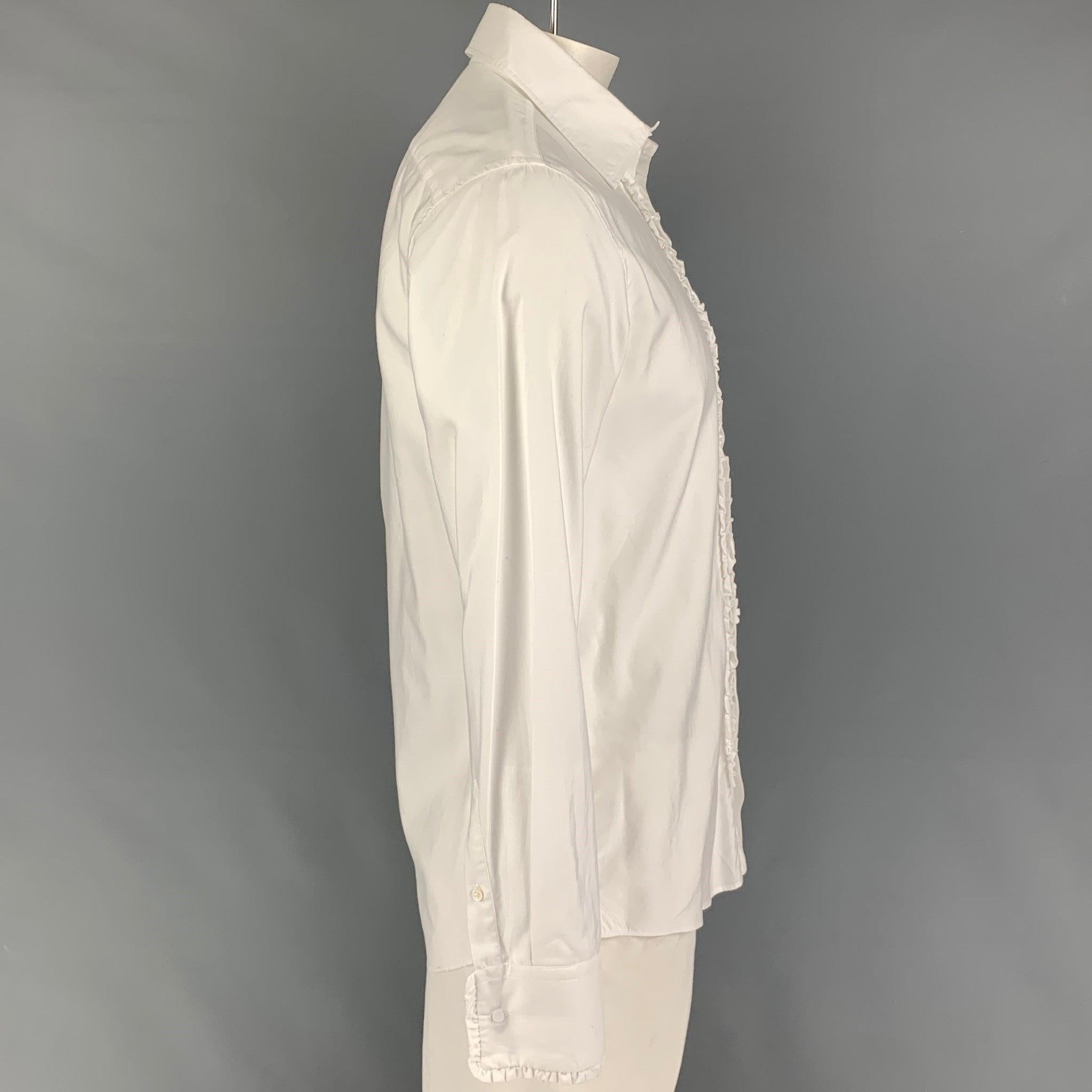 JIL SANDER long sleeve shirt comes in a white cotton featuring a ruffled trim, french cuffs, spread collar, and a button up closure. Cufflinks not included. Made in Italy.
Very Good
Pre-Owned Condition. 

Marked:   42 

Measurements: 
 
Shoulder: