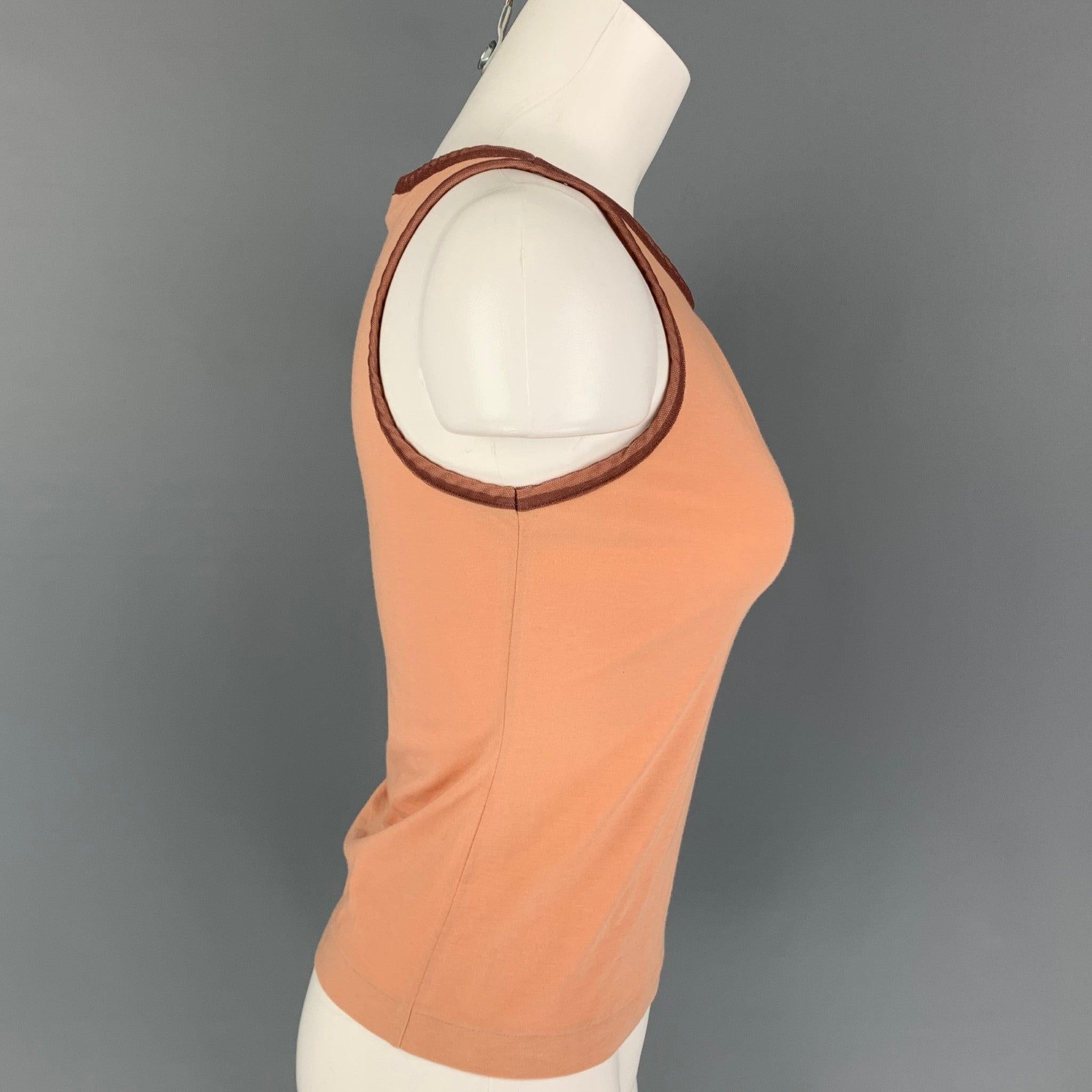 JIL SANDER tank top comes in a orange cotton featuring a mesh contrast trim.Very Good
Pre-Owned Condition. 

Marked:   Size tag removed.  

Measurements: 
 
Shoulder:
10.5 inches  Bust: 30 inches  Length: 19.5 inches 
  
  
 
Reference:
