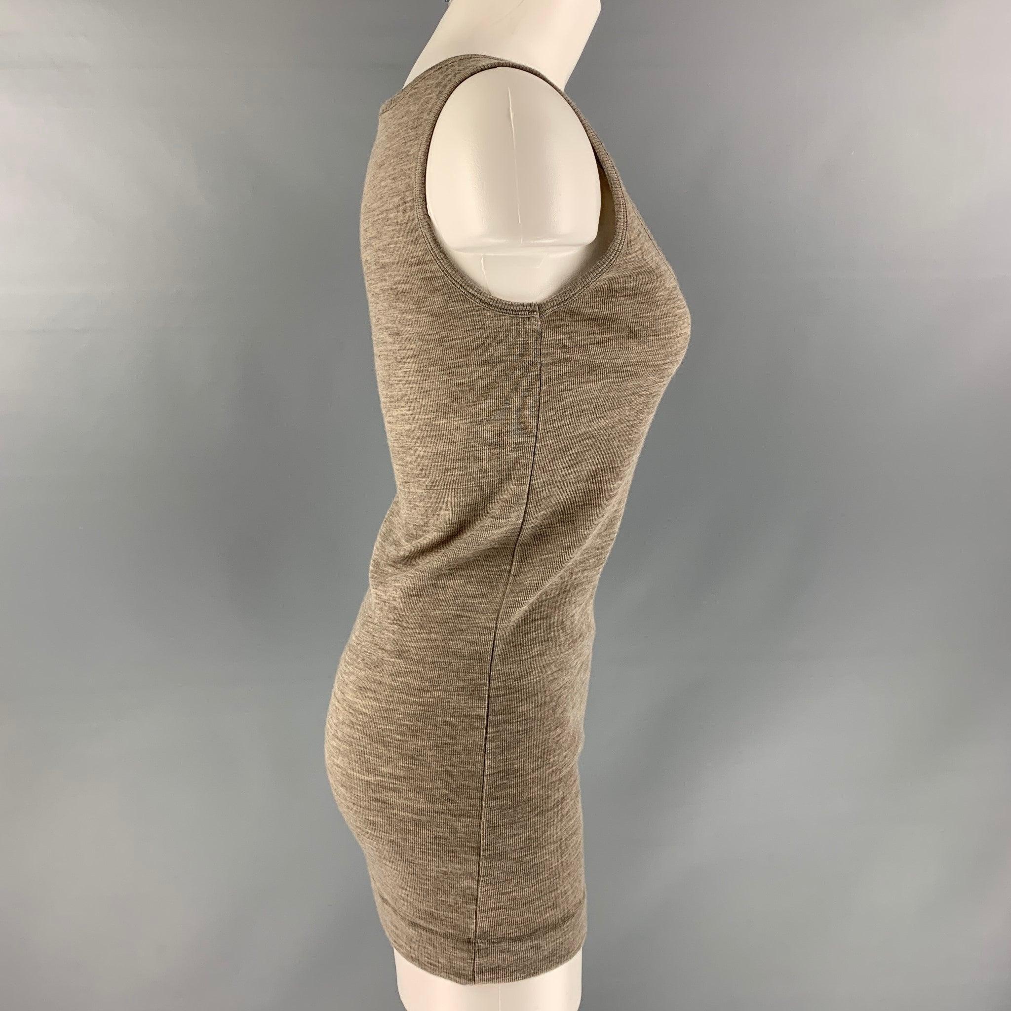 JIL SANDER tank top comes in heather taupe wool and angora ribbed knit. Made in Italy.Excellent Pre-Owned Condition. 
 

 Marked:  M 
 

 Measurements: 
  Bust: 34 inches Length: 26 inches  
  
  
  
 Sui Generis Reference: 97178
 Category: Casual