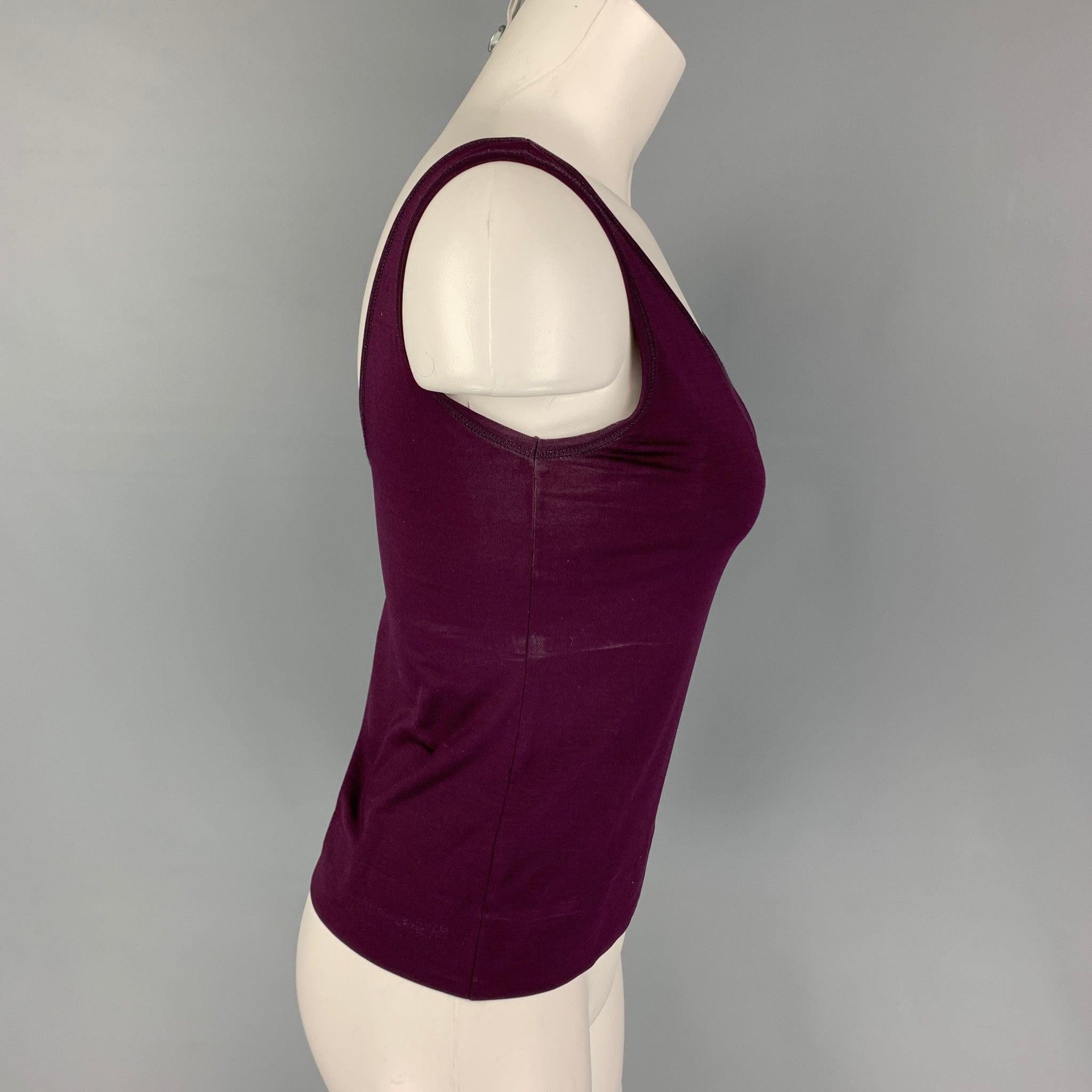 JIL SANDER tank top comes in a eggplant silk. Made in Italy.
Fair
Pre-Owned Condition. Moderate discoloration throughout. As-Is.  

Marked:   Size tag removed.  

Measurements: 
  Bust:
28 inches  Length: 11.5 inches 
  
  
 
Reference: