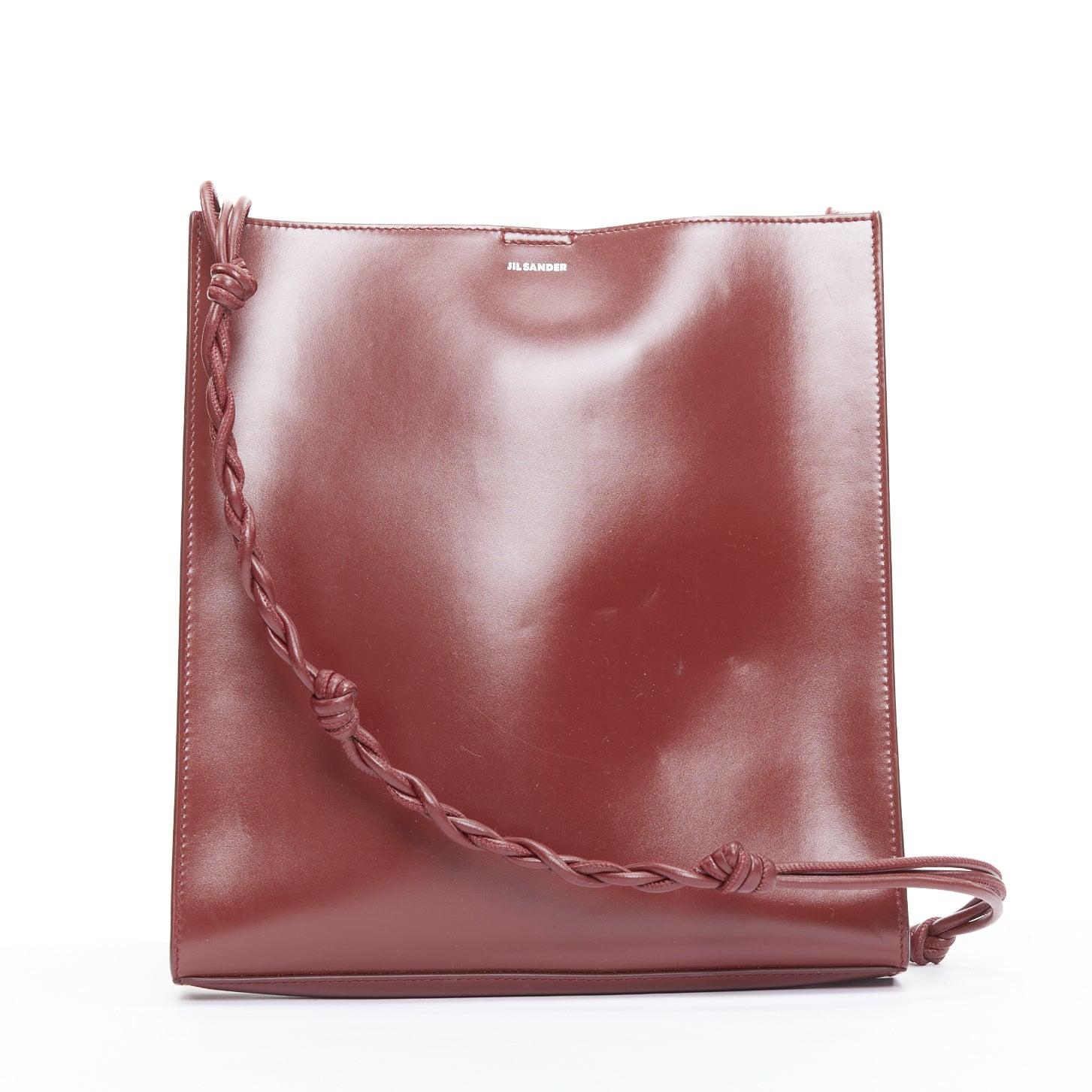 Brown JIL SANDER Tangle burgundy knotted leather strap medium crossbody bag