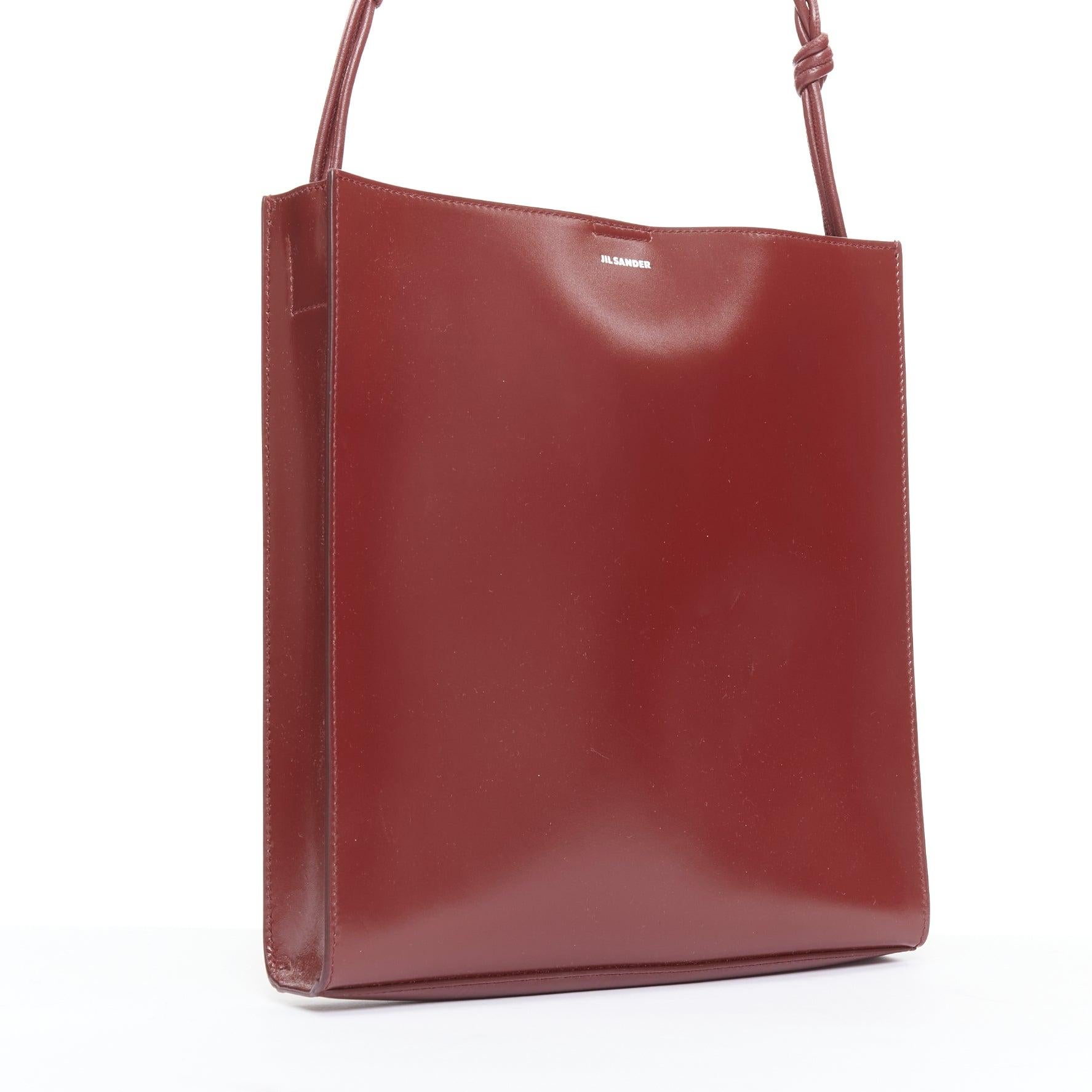 JIL SANDER Tangle burgundy knotted leather strap medium crossbody bag In Fair Condition In Hong Kong, NT