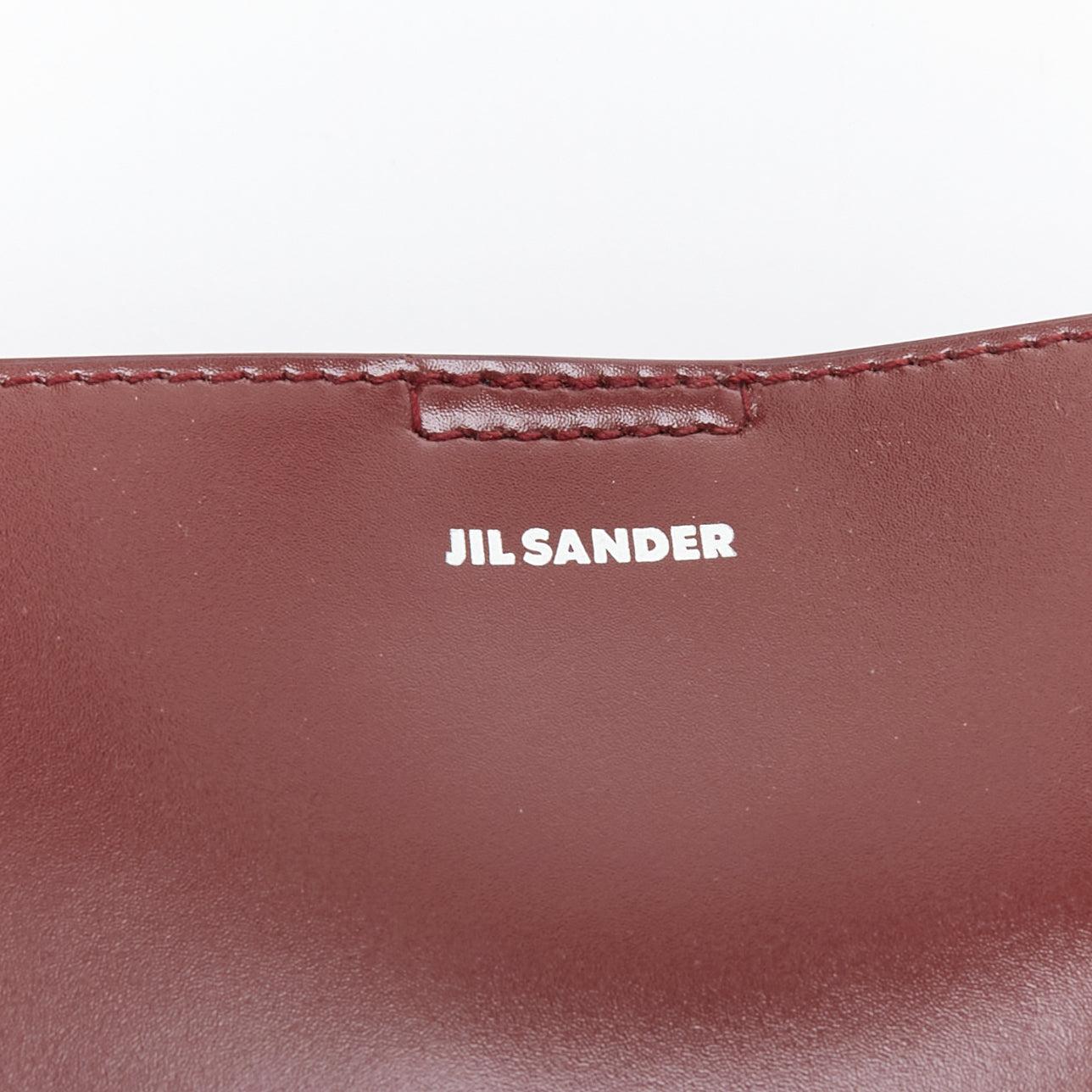 JIL SANDER Tangle burgundy knotted leather strap medium crossbody bag 3