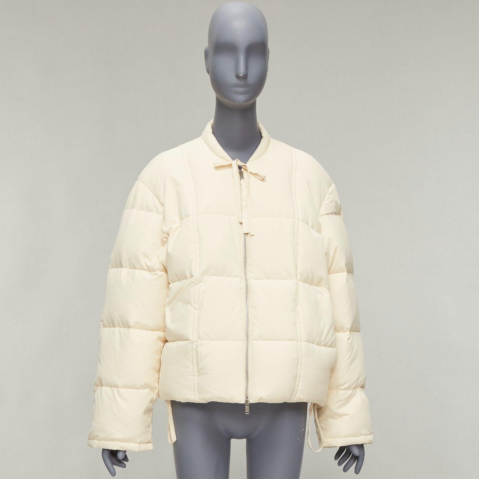 JIL SANDER + unisex cream water repellent 100% recycled cocoon puffer jacket M In Excellent Condition For Sale In Hong Kong, NT