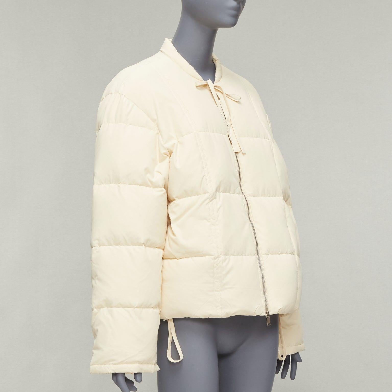 Women's JIL SANDER + unisex cream water repellent 100% recycled cocoon puffer jacket M For Sale