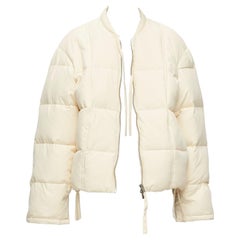 Jil Sander + giacca puffer unisex crema idrorepellente 100% riciclata M