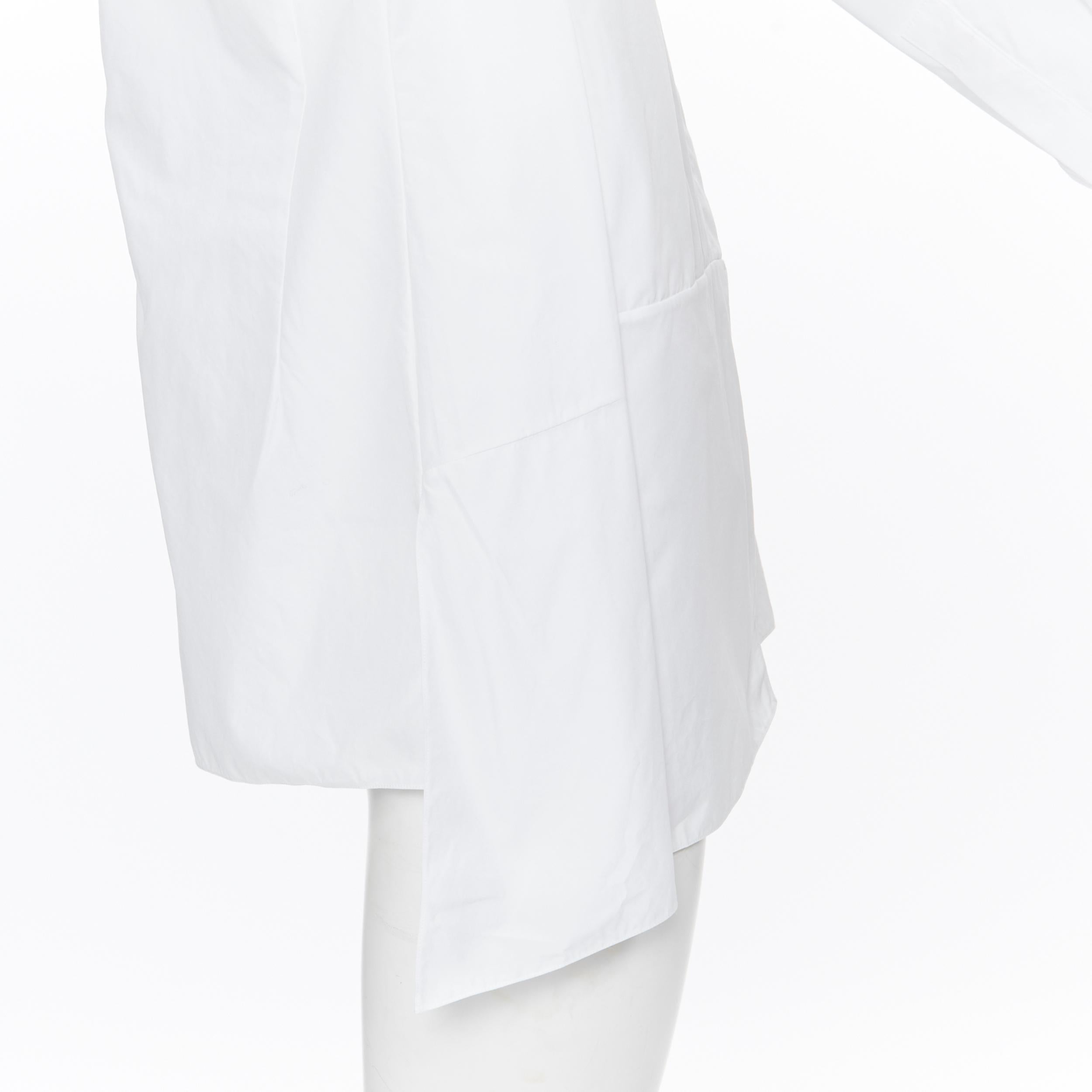 JIL SANDER white cotton minimalist high low panel insert button up shirt FR32
Brand: Jil Sander
Model Name / Style: Cotton shirt
Material: Cotton
Color: White
Pattern: Solid
Closure: Button
Extra Detail: Concealed button front closure. Insert panel