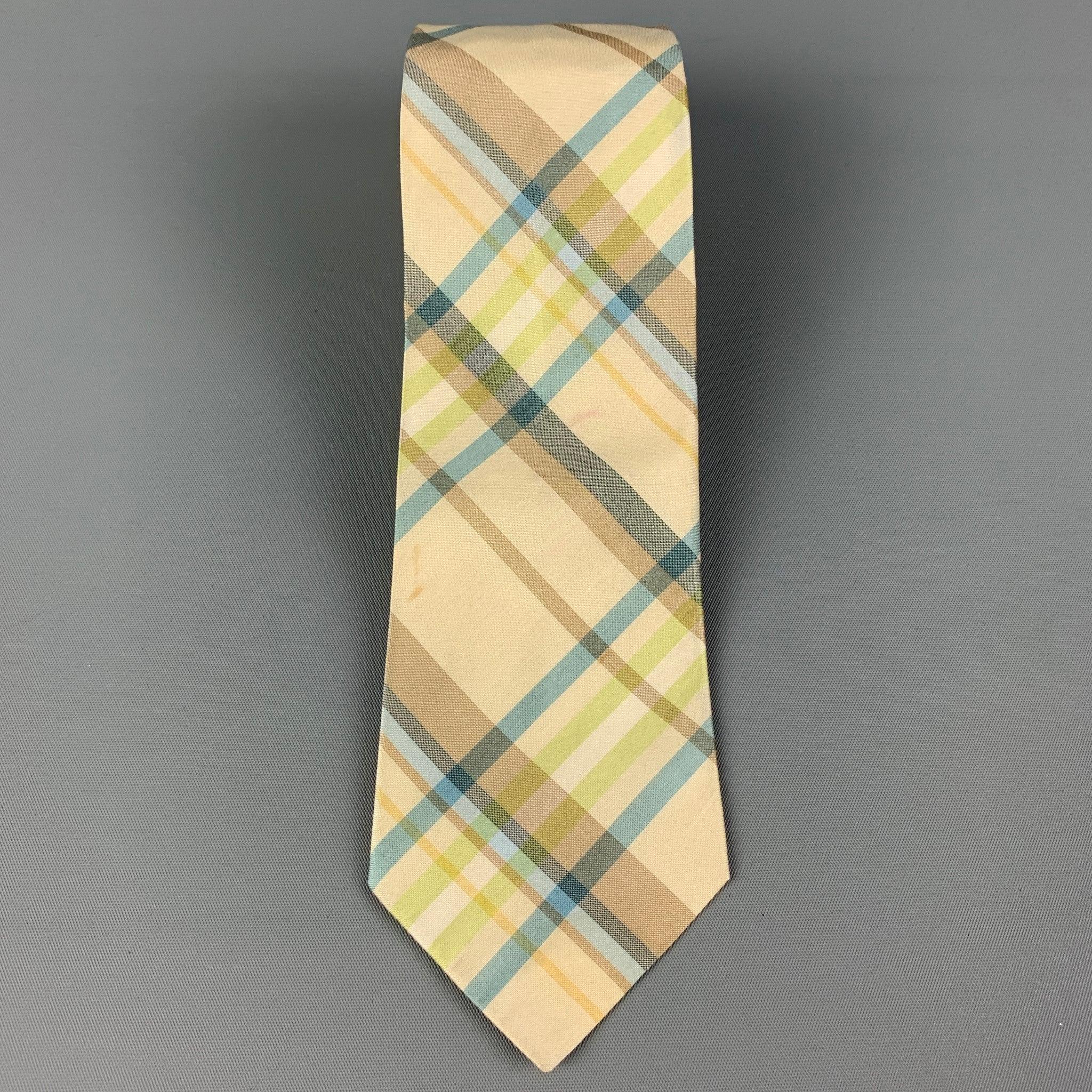 JIL SANDER
 necktie comes in a yellow & blue silk with a all over plaid print. Made in Italy. Good Pre-Owned Condition. Light marks. Width: 2.75 inches Length: 58 inches 
  
  
  
 Sui Generis Reference: 119897
 Category: Tie
 More Details
  
