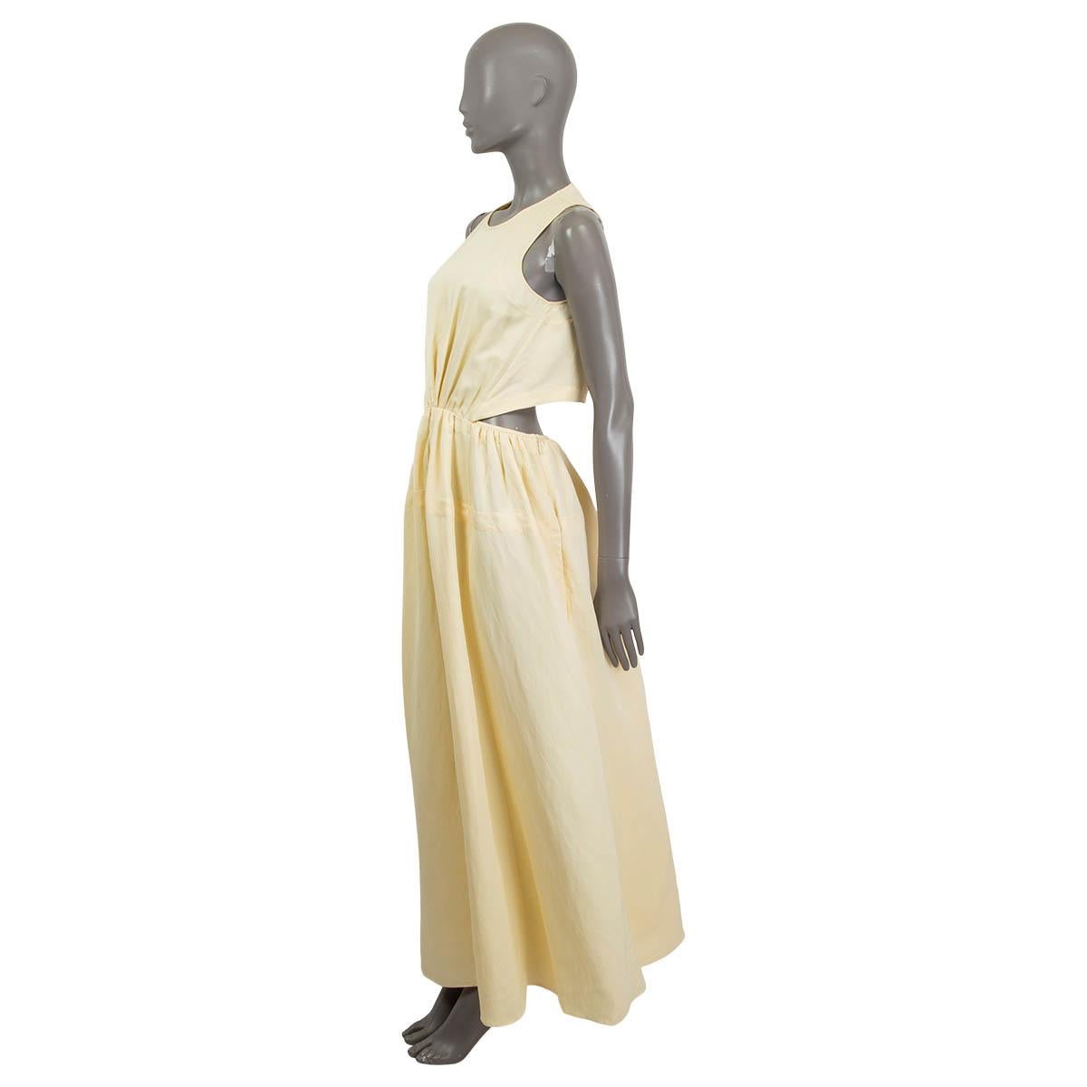 100% authentic Jil Sander sleeveless cut out maxi dress in vanilla viscose (74%) and linen (26%). Opens with a concealed zipper and a hook at the side and a button at the back. Unlined. Shows some stains and scratches of wearing at the hemline,