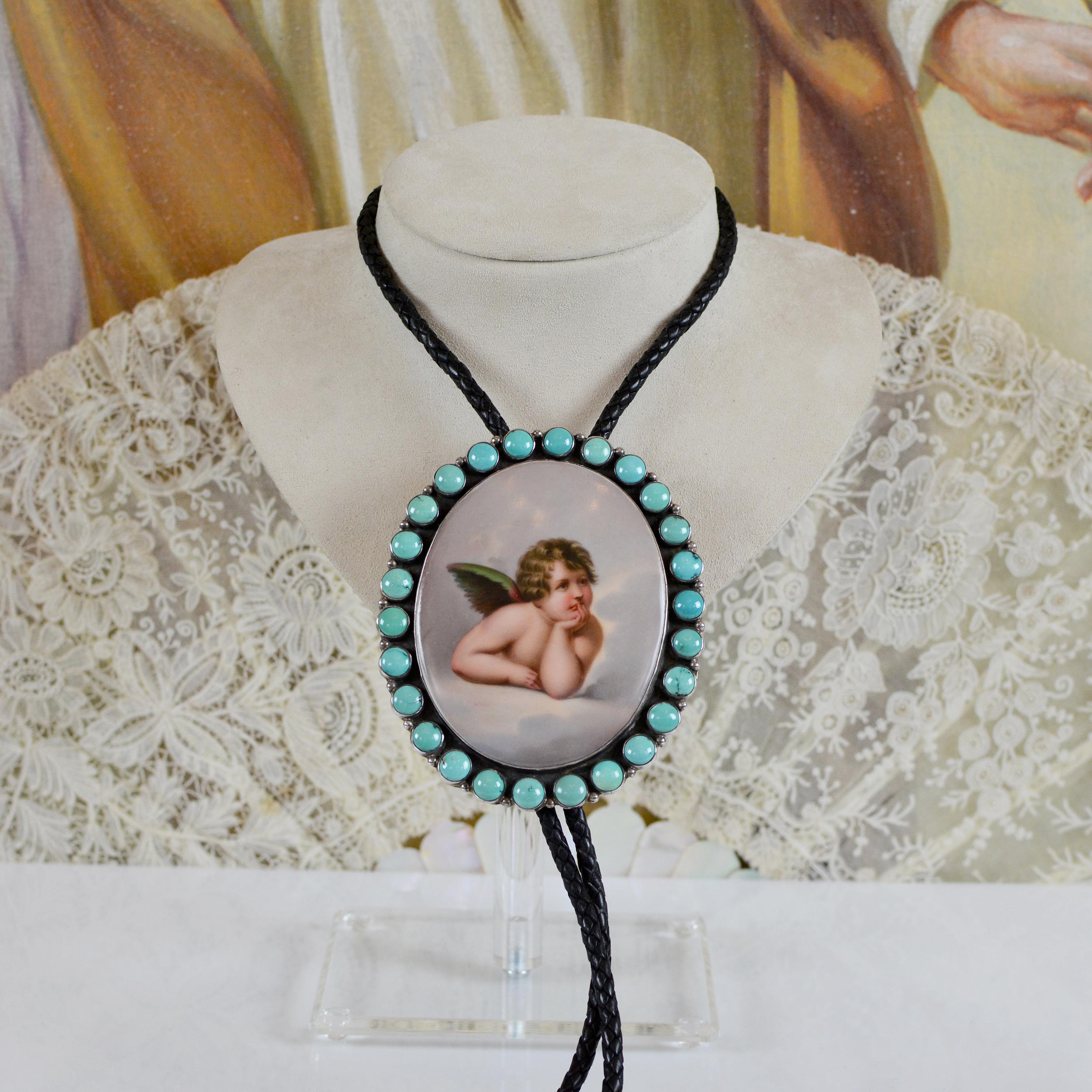 With a visionary approach to the classic, Western bolo, Jill Garber has designed this poetic piece around a 19th century hand-painted angel portrait on porcelain. The Sistine Madonna, also called The Madonna di San Sisto, is an oil painting by the