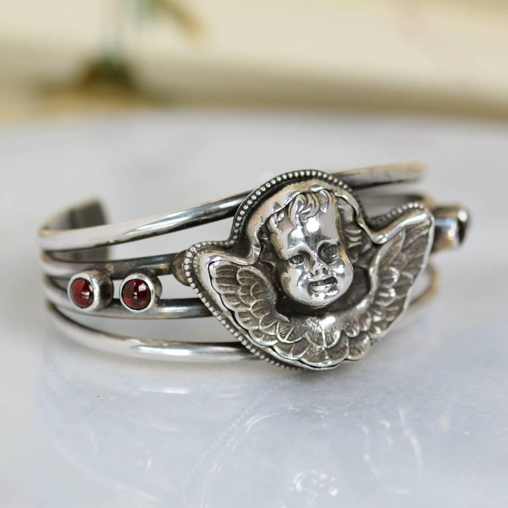 Jill Garber Figural Nineteenth Century Angel with Bohemian Garnets Cuff Bracelet In Excellent Condition For Sale In Saginaw, MI