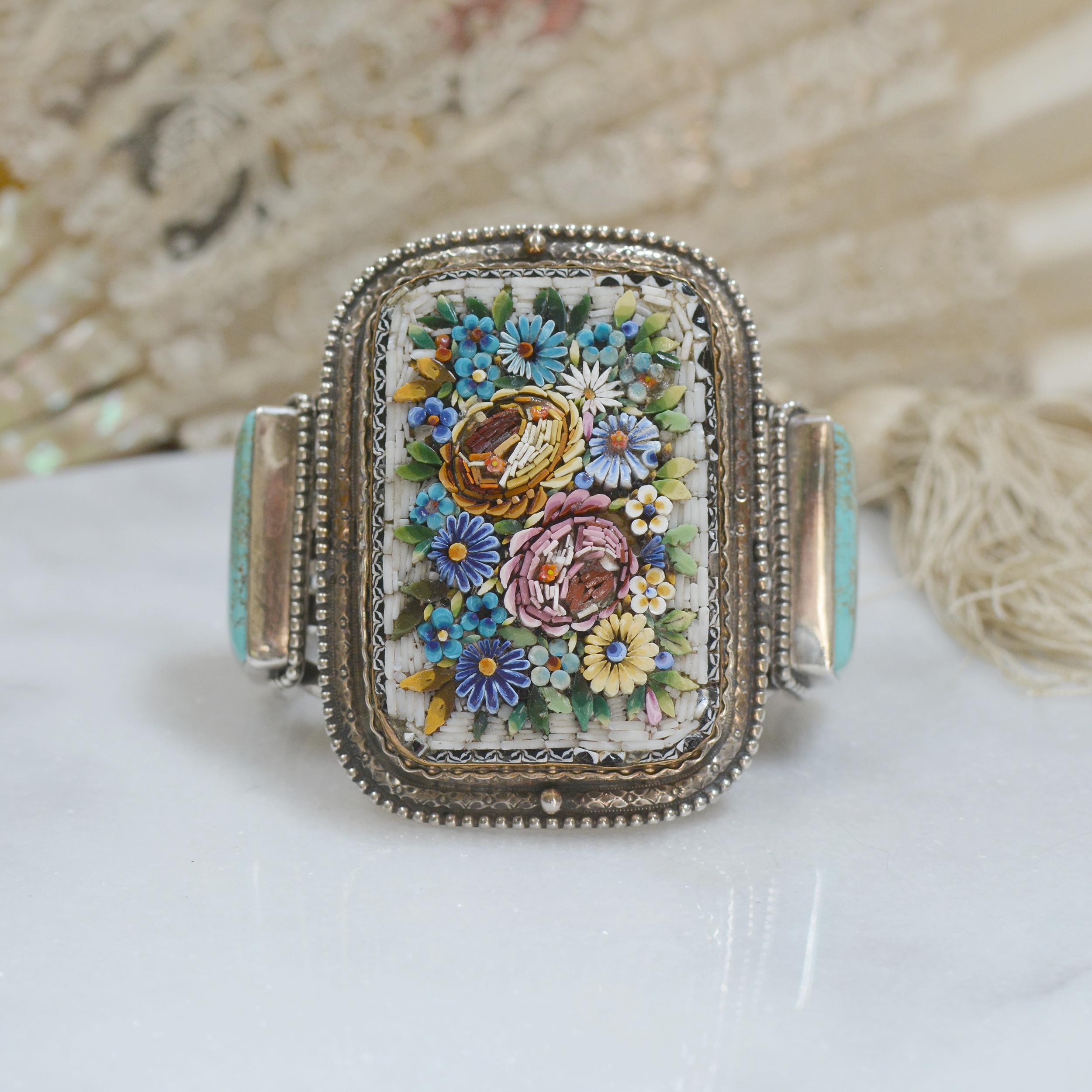 This divine, one of a kind cuff bracelet is designed with a large nineteenth century Grand Tour - Venetian micro-mosaic floral bouquet masterpiece. Mounted within original gold vermeil mounting, which has been meticulously transformed with an
